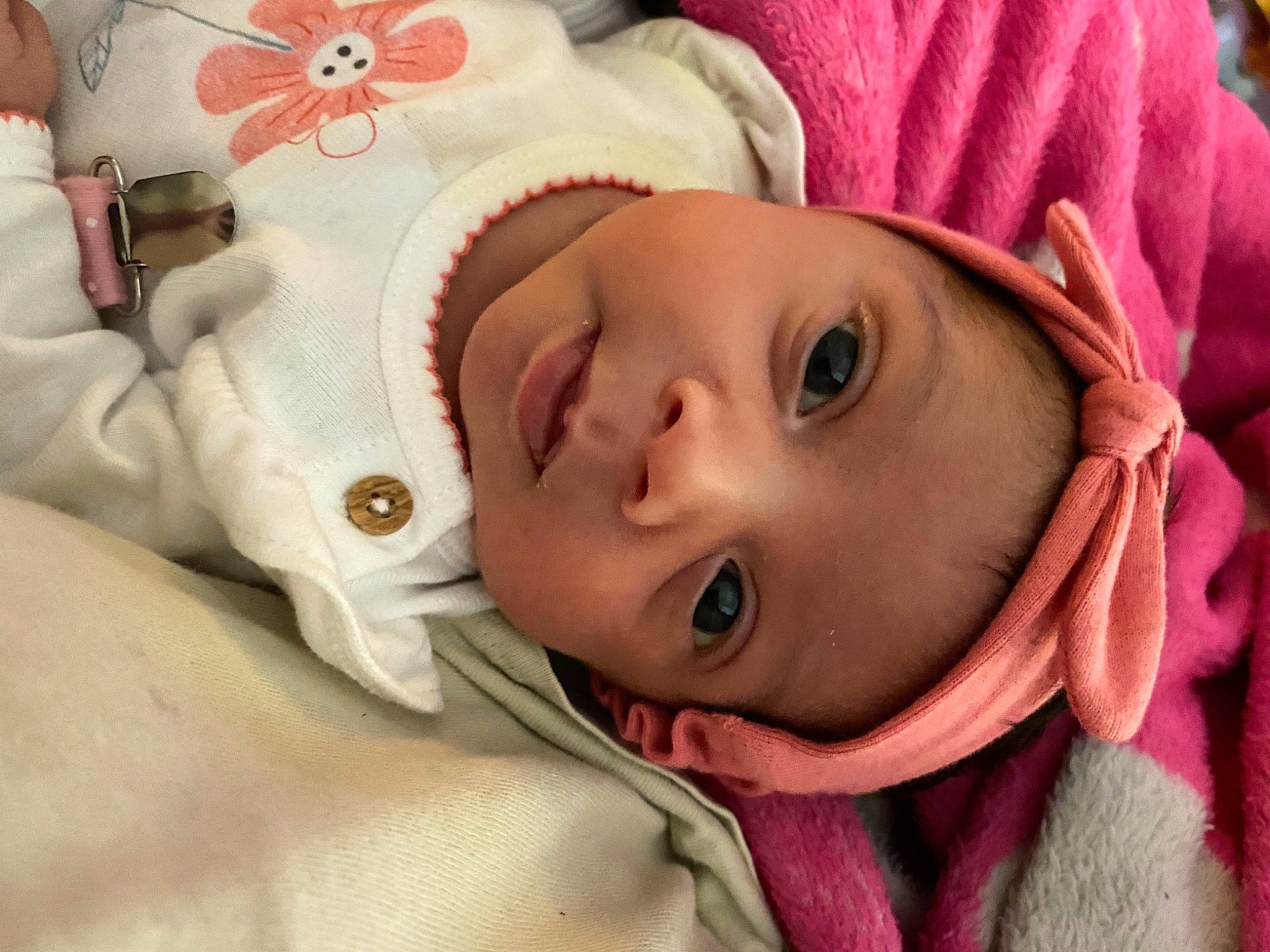 Brynlie is registered to the contest to win money with this photo: baby_toddler_clothing, cheek, chin, eye, eyebrow, eyelash, happy, headgear, iris, lip, mammal, mouth, neck, nose, person, pink, skin, sleeve, smile, textile