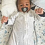 Melvyn a rejoint le concours — aidez-le/la à gagner de superbes lots ! baby, bed, bedroom, blanket, bodypart, clothing, coat, cushion, face, finger, furniture, hand, head, homedecor, indoors, pants, person, photography, portrait, room