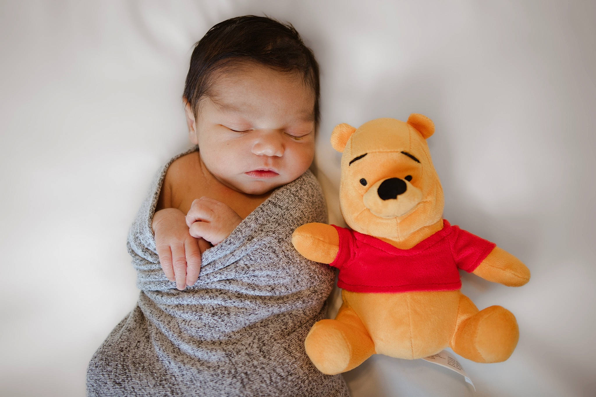 Khalil is registered to the contest to win money with this photo: baby, baby_toddler_clothing, cheek, child, comfort, doll, flash_photography, fur, gesture, happy, head, nose, person, plush, skin, sleeve, stuffed_toy, teddy_bear, thumb, toddler