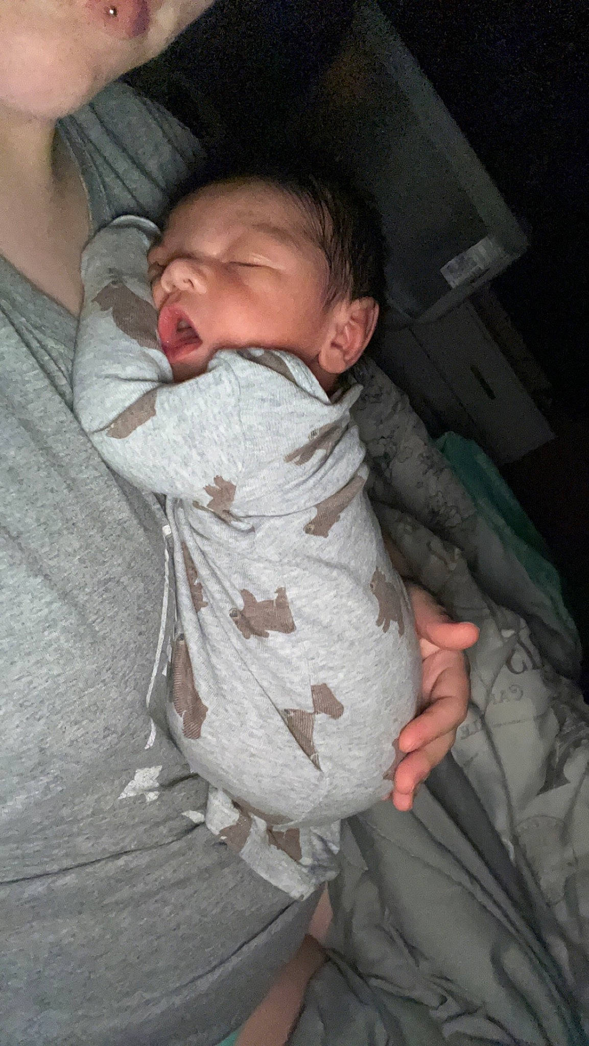 Khalil is registered to the contest to win money with this photo: abdomen, baby, baby_products, baby_toddler_clothing, cheek, child, comfort, elbow, eye, gesture, iris, linens, military_camouflage, mouth, nose, person, sitting, skin, sleeve, thumb