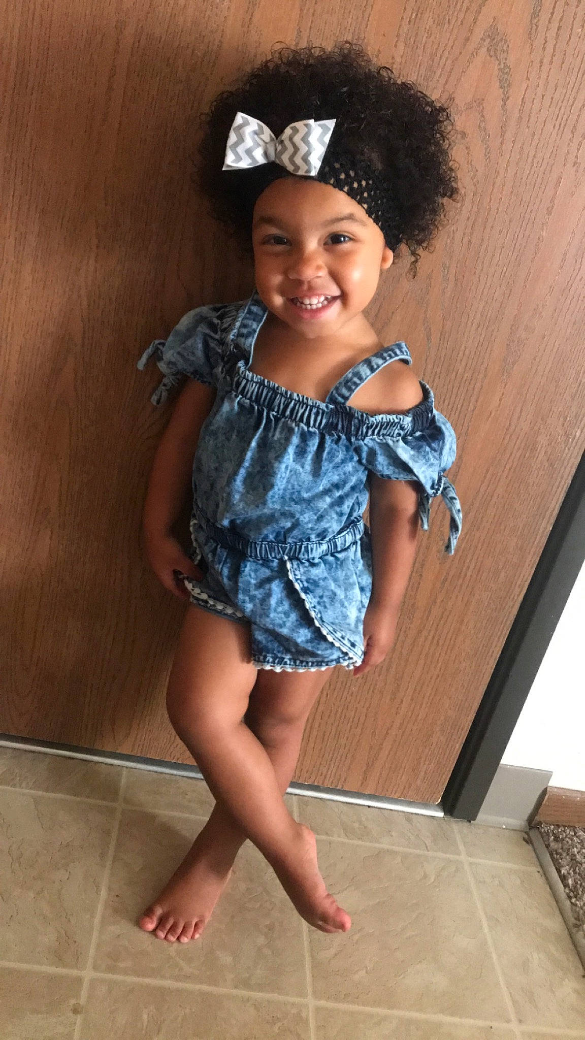 Zendayah is registered to the contest to win money with this photo: child, child_model, clothing, fun, headpiece, human_leg, joint, joy, leg, person, shoulder, smile, thigh, toddler