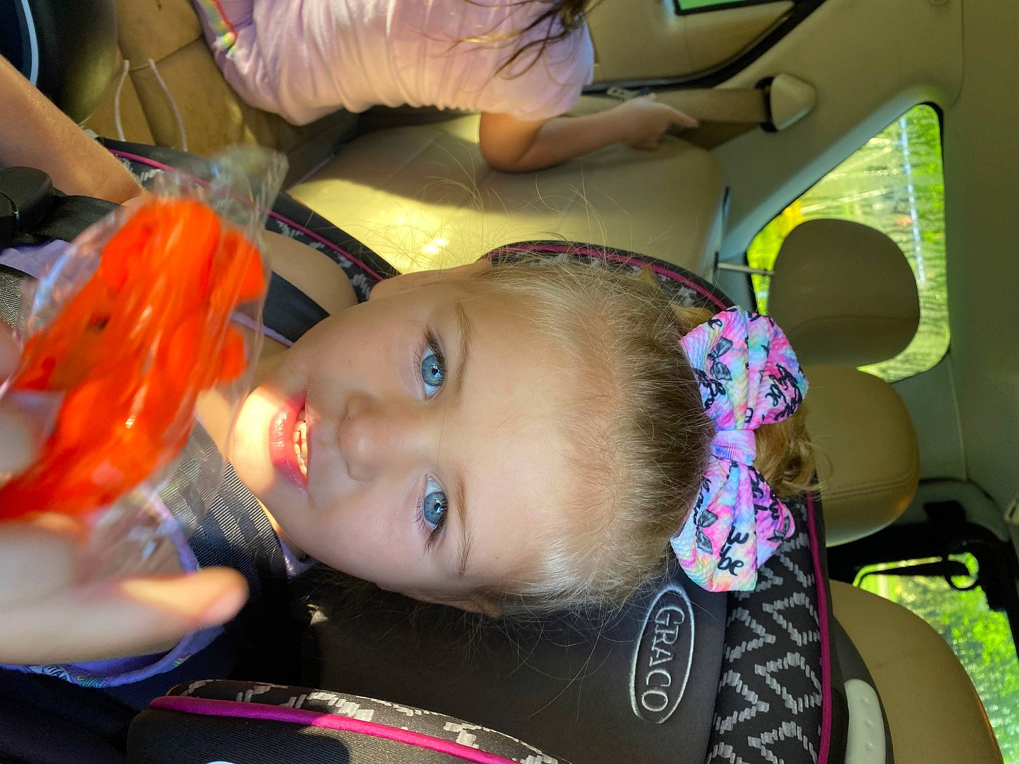 Jaylee joined the competition — help win amazing prizes! baby, baby_products, car_seat, cheek, child, ear, eye, eyebrow, eyelash, fun, happy, leisure, mouth, neck, nose, person, pink, skin, smile, toddler