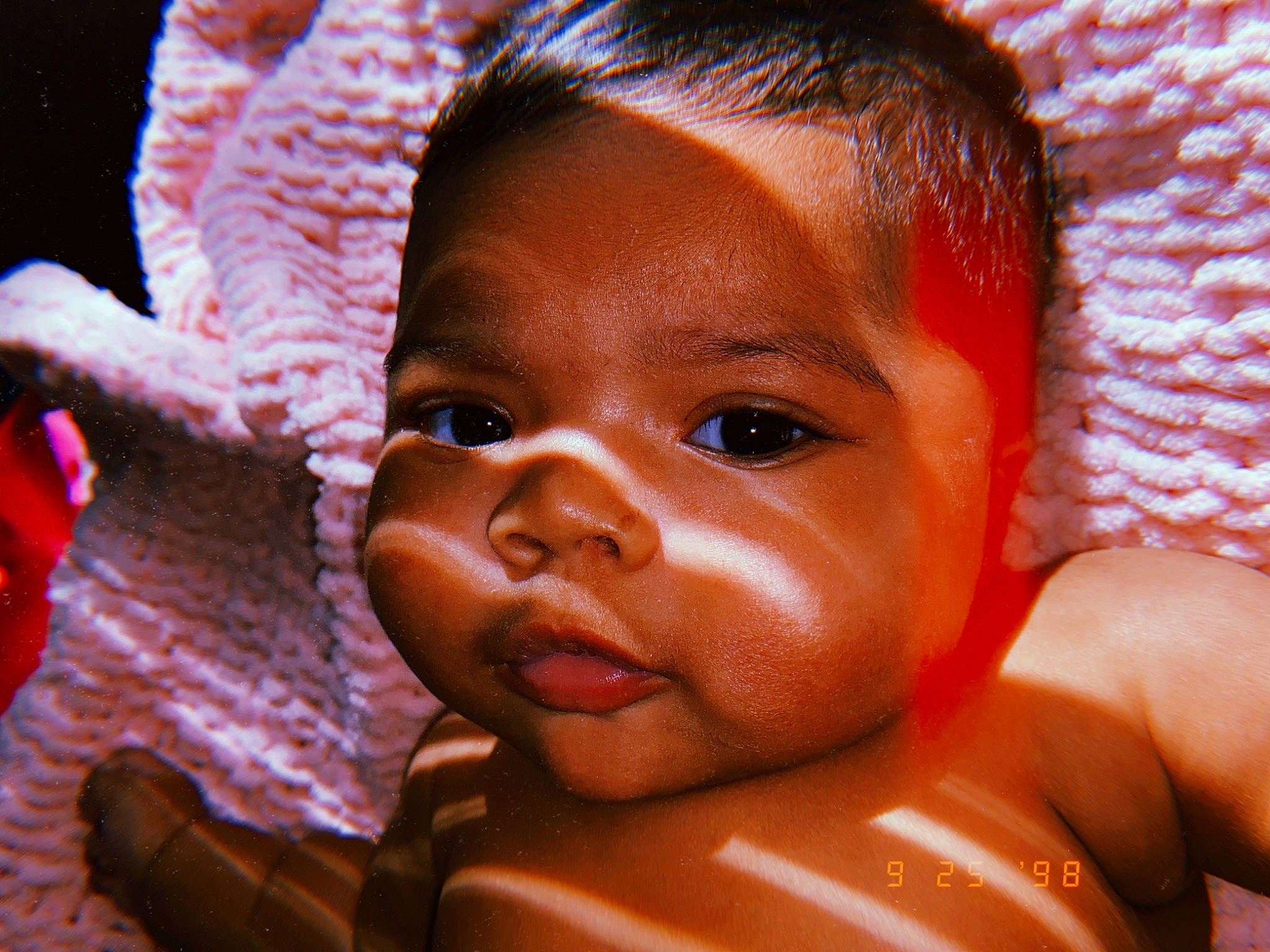 Maliah is registered to the contest to win money with this photo: arm, baby, cheek, chin, ear, eyebrow, eyelash, facial_expression, finger, forehead, gesture, happy, human_body, iris, lip, mouth, nose, organ, person, skin