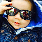 Emin joined the competition — help win amazing prizes! baby, black, blue, casual, child, closeup, cute, denim_jacket, face, fashion, hand, headwear, hood, outdoor, person, photography, portrait, reflection, smile, sunglasses