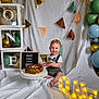 Noah is registered to the contest to win money with this photo: baby, birthday, cake, cake_smash, celebration, balloons, decorations, white_backdrop, child, smiling, suspenders, bow_tie, wooden_spoon, cake_stand, letters, illuminated_letters, letter_board, colorful, first_birthday, festive