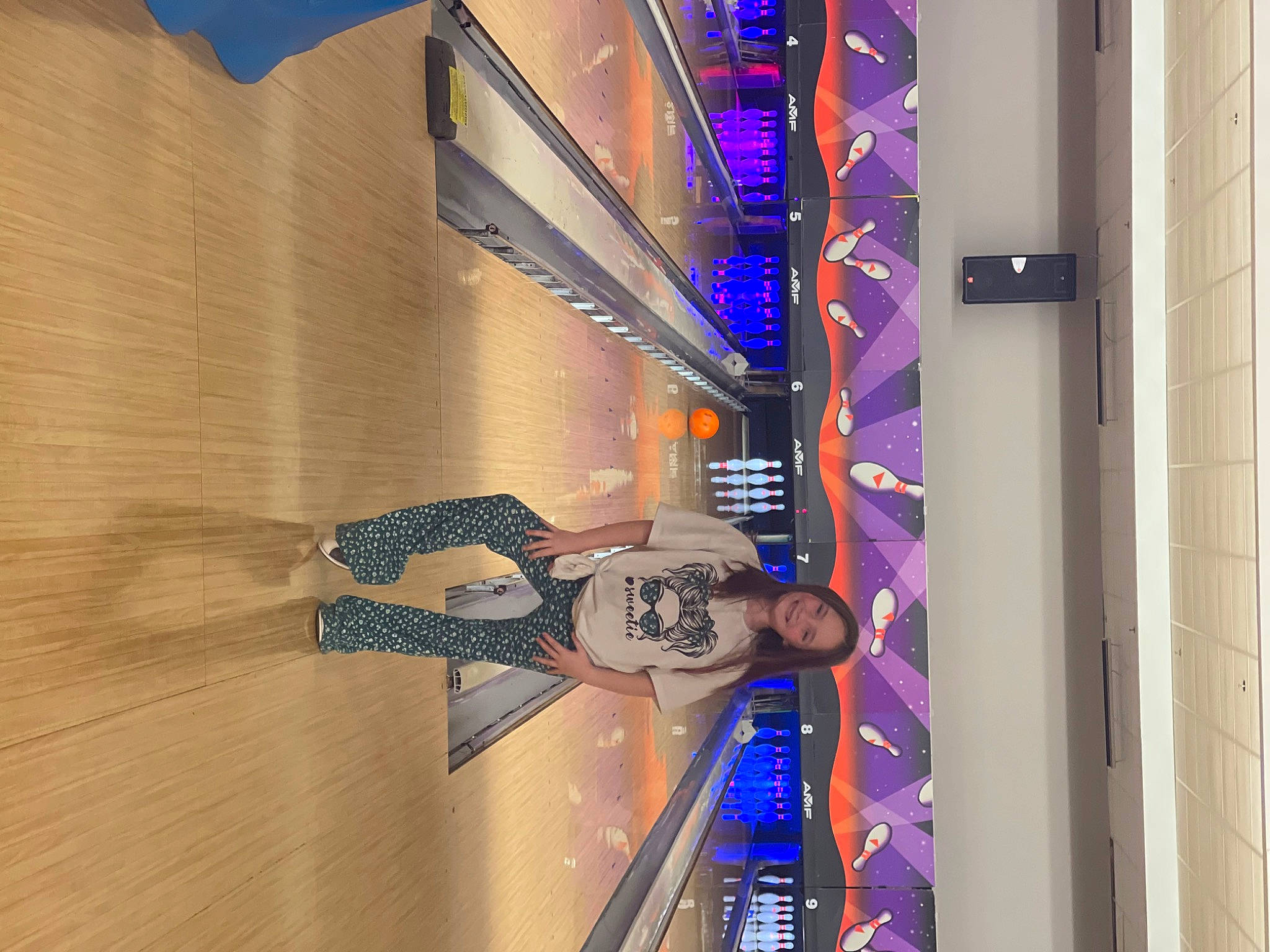 Saphira is registered to the contest to win money with this photo: advertising, banner, building, ceiling, electric_blue, flooring, hardwood, joy, machine, magenta, person, purple, stairs, wood