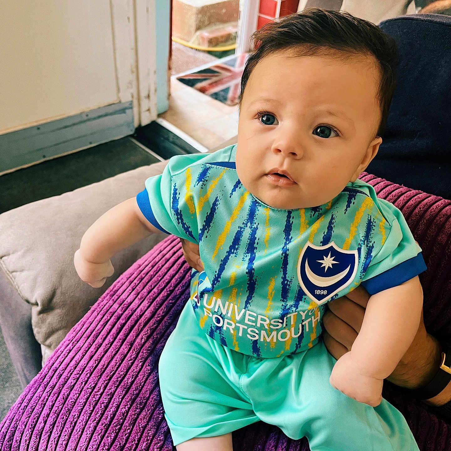 Woody joined the competition — help win amazing prizes! baby, blackhair, clothing, couch, cushion, face, furniture, hair, happy, head, homedecor, pants, people, person, photography, portrait, shorts, sitting, sleeve, t_shirt
