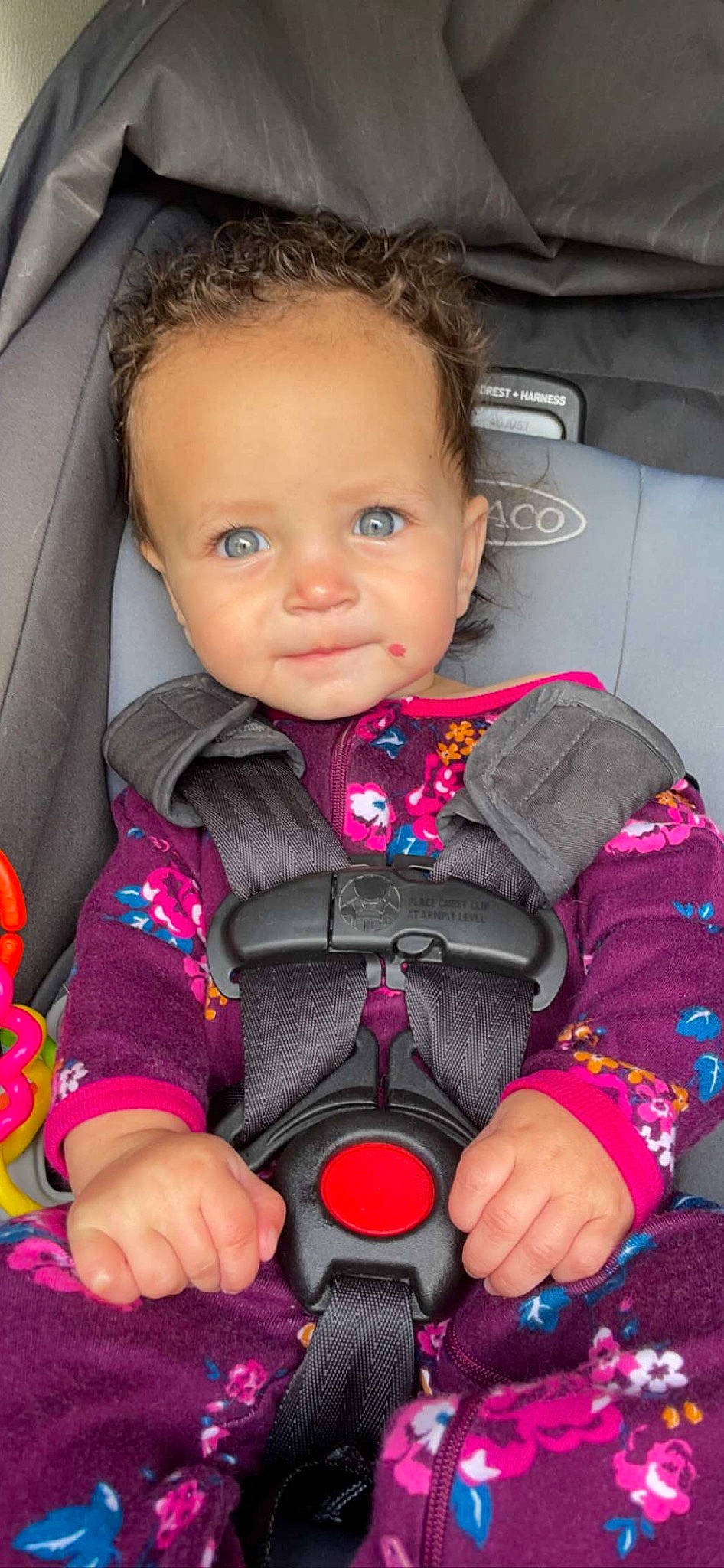 Harper is registered to the contest to win money with this photo: auto_part, baby, baby_in_car_seat, baby_products, baby_toddler_clothing, car_seat, cheek, child, collar, comfort, face, fun, magenta, outerwear, person, pink, seat_belt, sitting, skin, sleeve