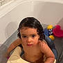 Alya participe au concours pour gagner de l'argent avec cette photo : child, toddler, bathtub, bath, water, wet_hair, rubber_duck, toy, bath_seat, staring, face, eyes, skin, playing, bath_toys, bathroom, shampoo_bottle, soap, plastic, portrait