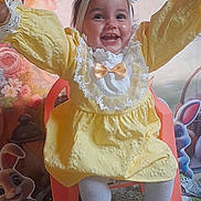 Seylie participe au concours pour gagner de l'argent avec cette photo : baby, child, yellow_dress, headband, bow, smiling, chair, white_tights, white_shoes, happy, indoor, decorations, cartoon_bunny, floral_background, celebration, cute, portrait, infant, joyful, playful