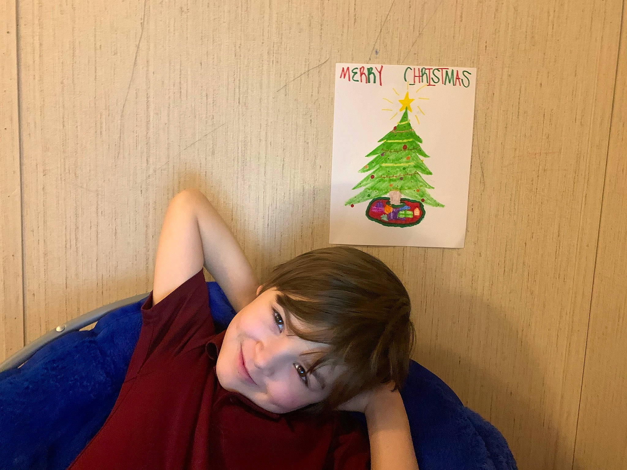 Drake joined the competition — help win amazing prizes! christmas_tree, comfort, cone, conifer, elbow, electric_blue, event, evergreen, fun, happy, holiday, human_leg, joy, knee, party_hat, person, room, sitting, t_shirt, tree