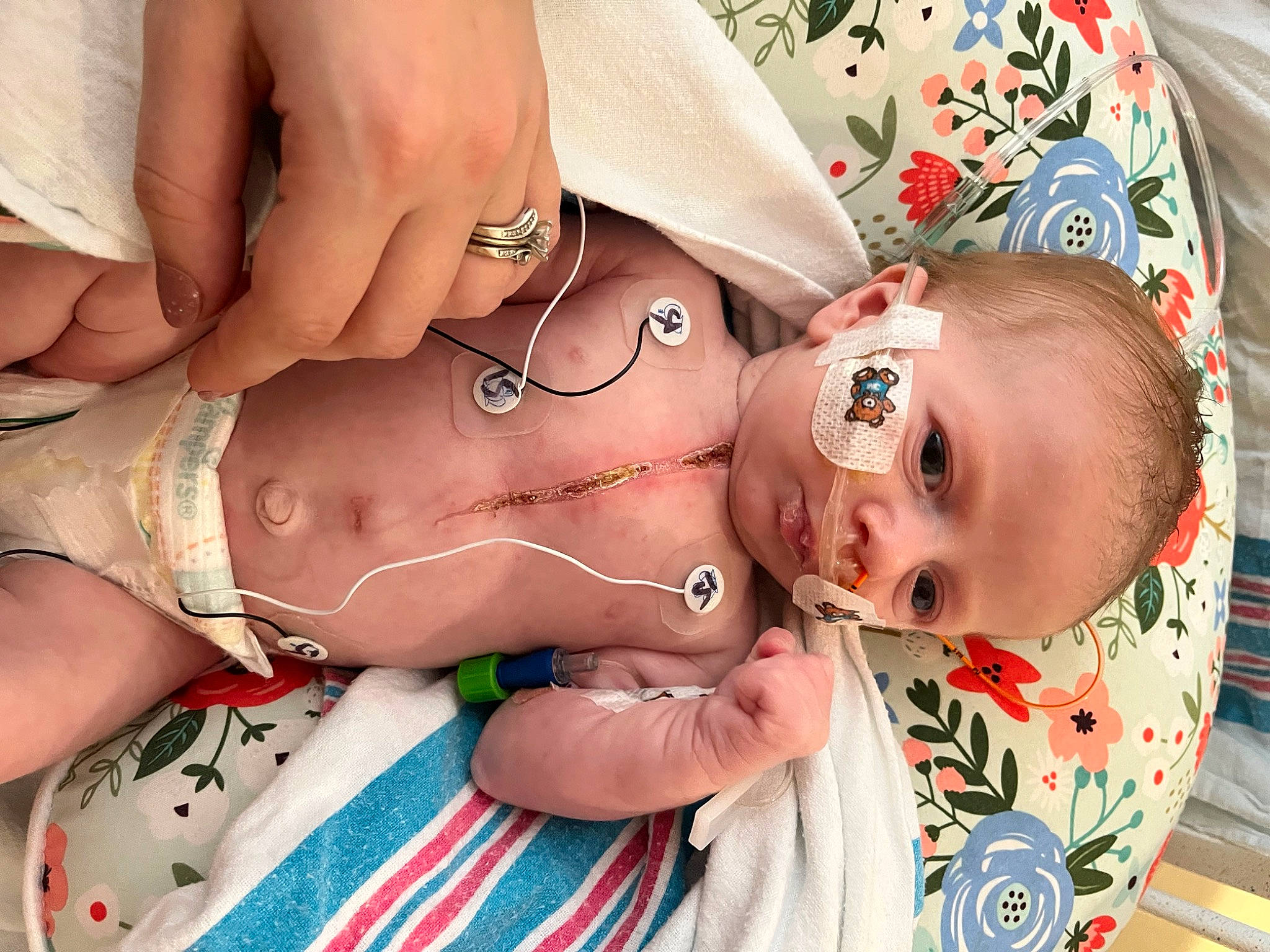 Maude Everleigh Mae is registered to the contest to win money with this photo: baby, baby_toddler_clothing, child, event, eyelash, facial_expression, fashion_accessory, finger, gesture, hand, happy, human, jewellery, mouth, nail, pattern, person, skin, thumb, toddler