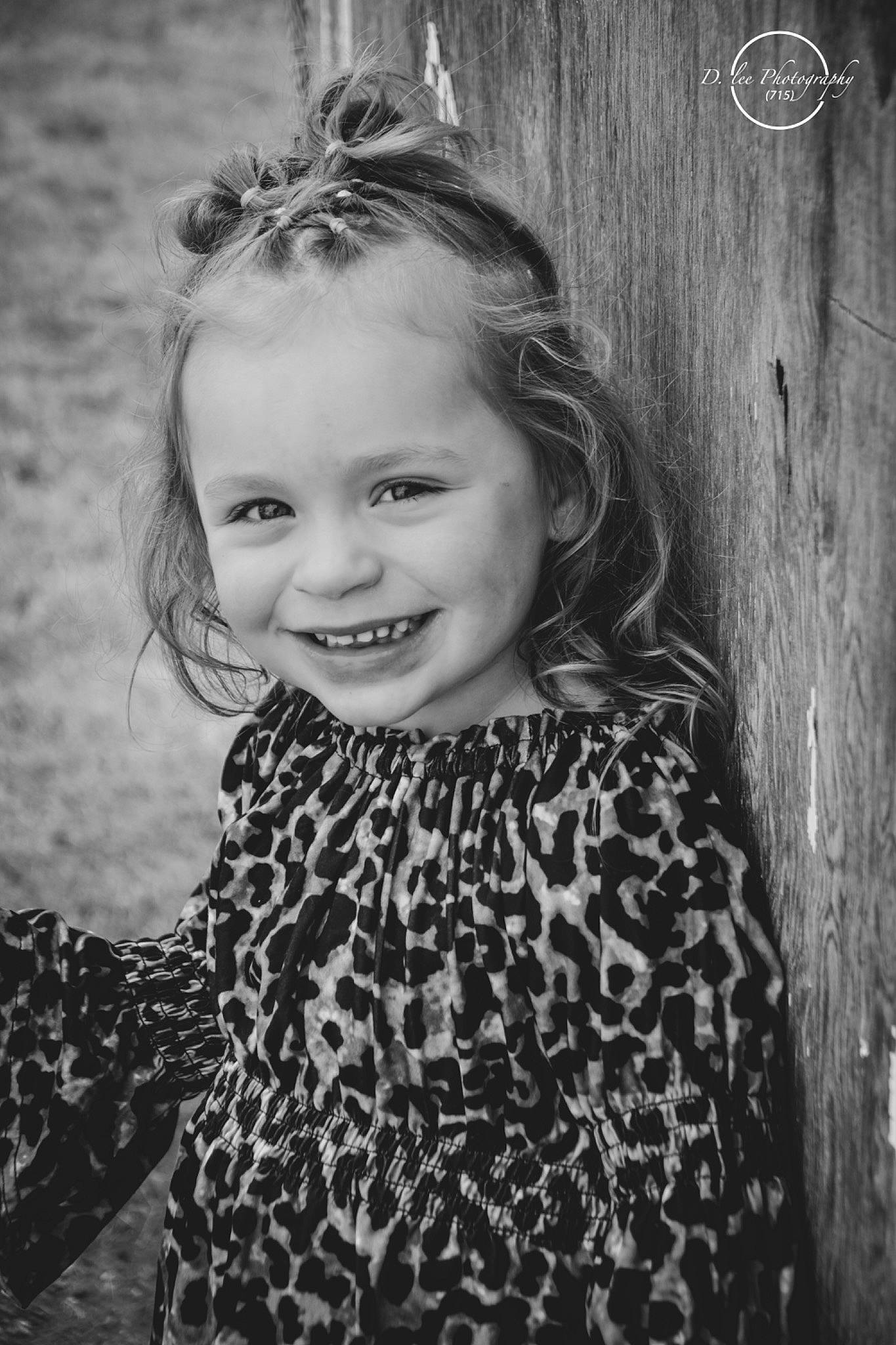 Vivian is registered to the contest to win money with this photo: black, black_and_white, eye, face, flash_photography, grass, hair, hairstyle, happy, head, iris, joy, monochrome, organ, people_in_nature, person, photograph, smile, standing, style