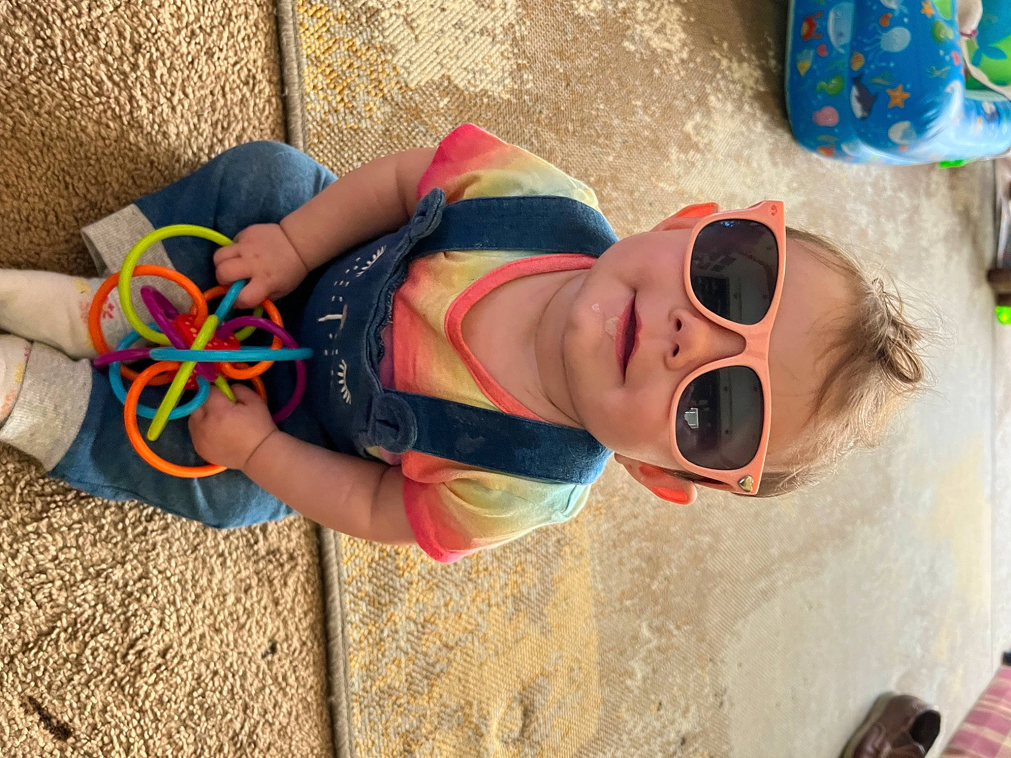 Kinzley is registered to the contest to win money with this photo: child, eyewear, fun, goggles, happy, hat, human_leg, landscape, leg, leisure, people_in_nature, person, personal_protective_equipment, play, smile, sunglasses, swimwear, thigh, toddler, vacation