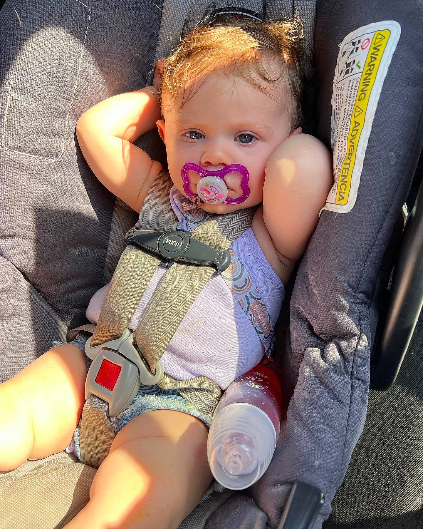 Kinzley is registered to the contest to win money with this photo: arm, baby, baby_carriage, baby_in_car_seat, baby_toddler_clothing, cheek, comfort, eye, finger, hand, joint, knee, lap, leg, mouth, nail, organ, person, skin, thigh