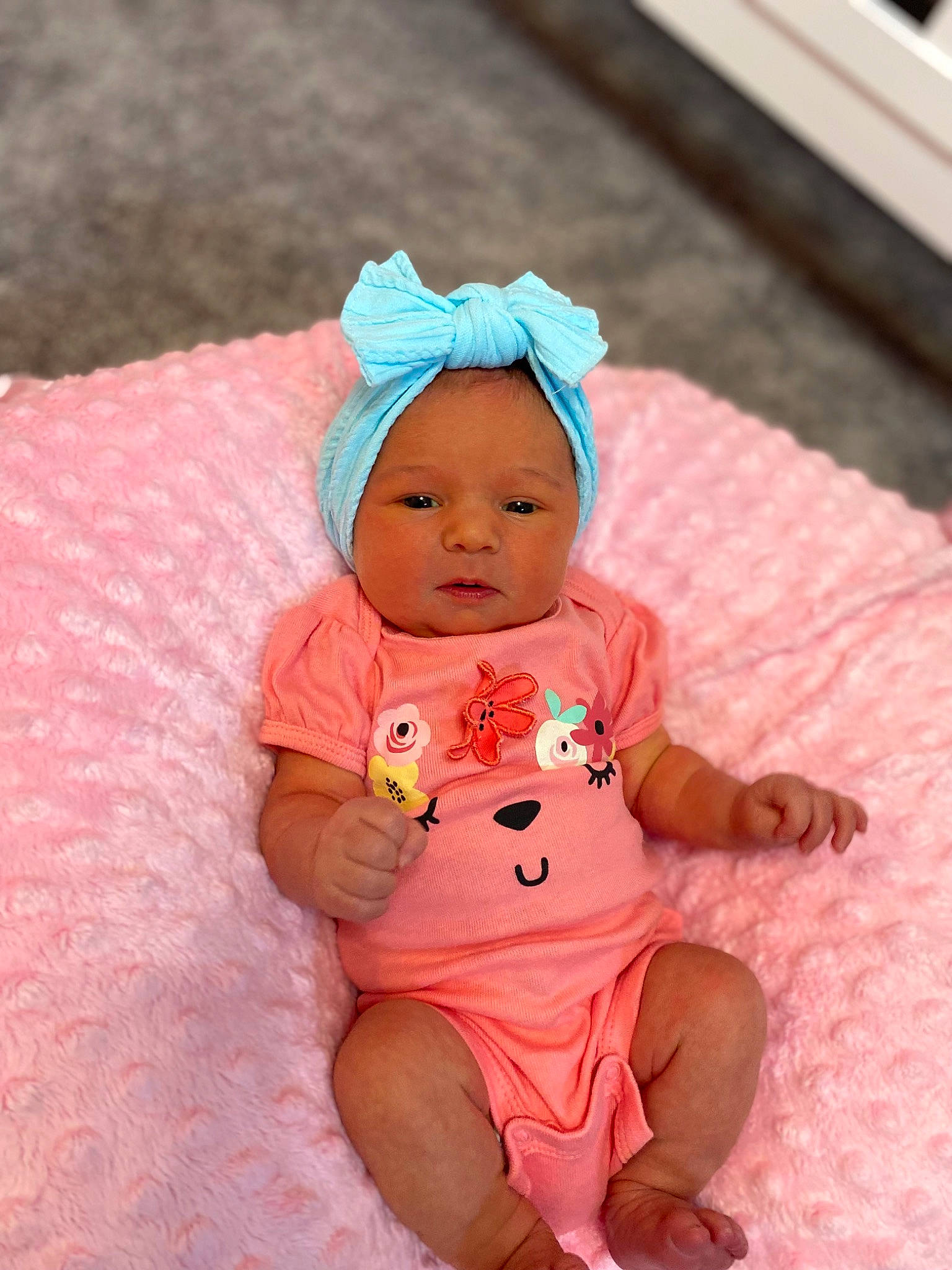 Parker joined the competition — help win amazing prizes! baby, baby_toddler_clothing, cap, cheek, child, costume_hat, eye, fashion_accessory, fun, happy, head, headgear, headwear, linens, magenta, peach, person, pink, sitting, skin