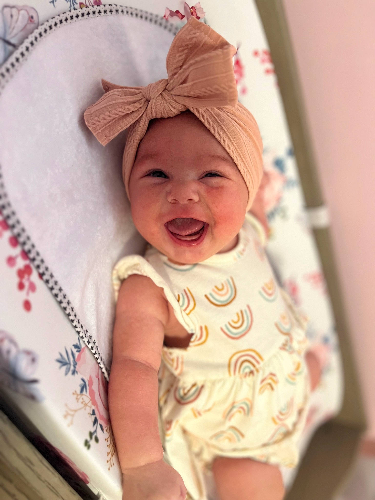 Parker is registered to the contest to win money with this photo: baby, baby_products, baby_toddler_clothing, cap, cheek, child, chin, eye, fashion_accessory, happy, head, headwear, lip, mouth, peach, person, pink, product, skin, sleeve