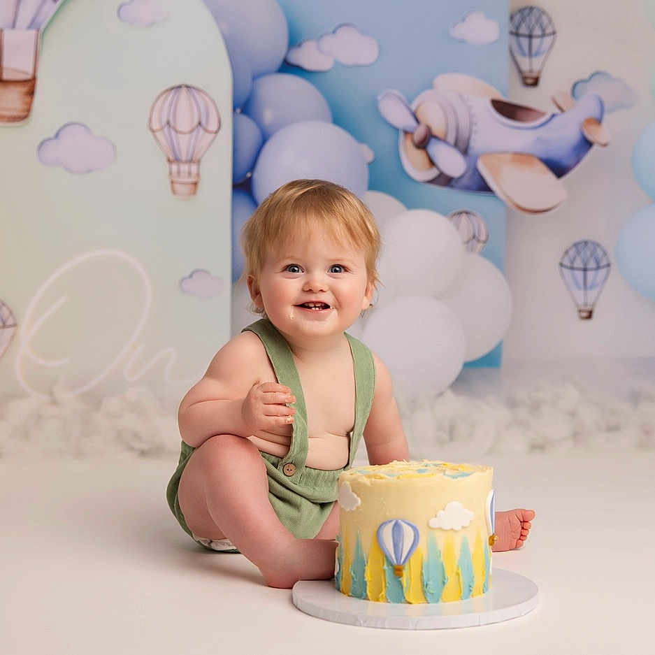 Brody joined the competition — help win amazing prizes! baby, balloon, birthdaycake, birthdayparty, cake, cream, cupcake, dessert, face, food, fun, head, icecream, icing, party, people, person, photography, portrait, sitting