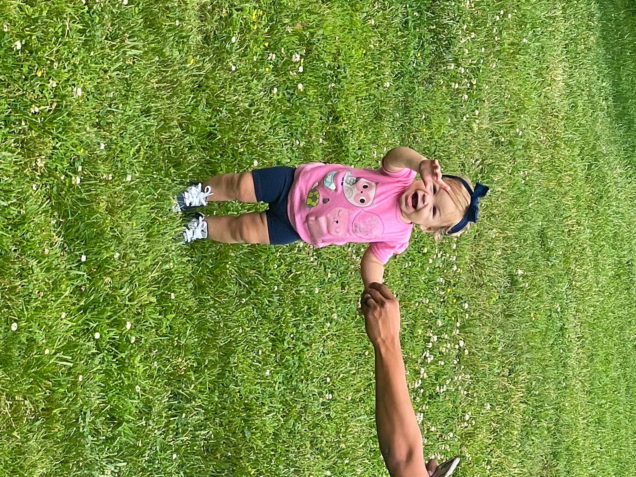 Naiomi is registered to the contest to win money with this photo: fun, garden, grass, grassland, green, happy, lawn, leaf, leisure, magenta, meadow, natural_environment, pasture, people_in_nature, person, plant, prairie, recreation, shrub, toddler