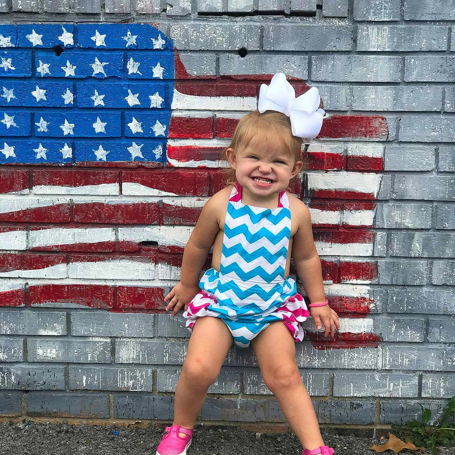 Raylyn is registered to the contest to win money with this photo: blue, child, cool, day, fun, girl, joy, leg, pattern, person, pink, play, product, recreation, red, shorts, smile, standing, summer, toddler