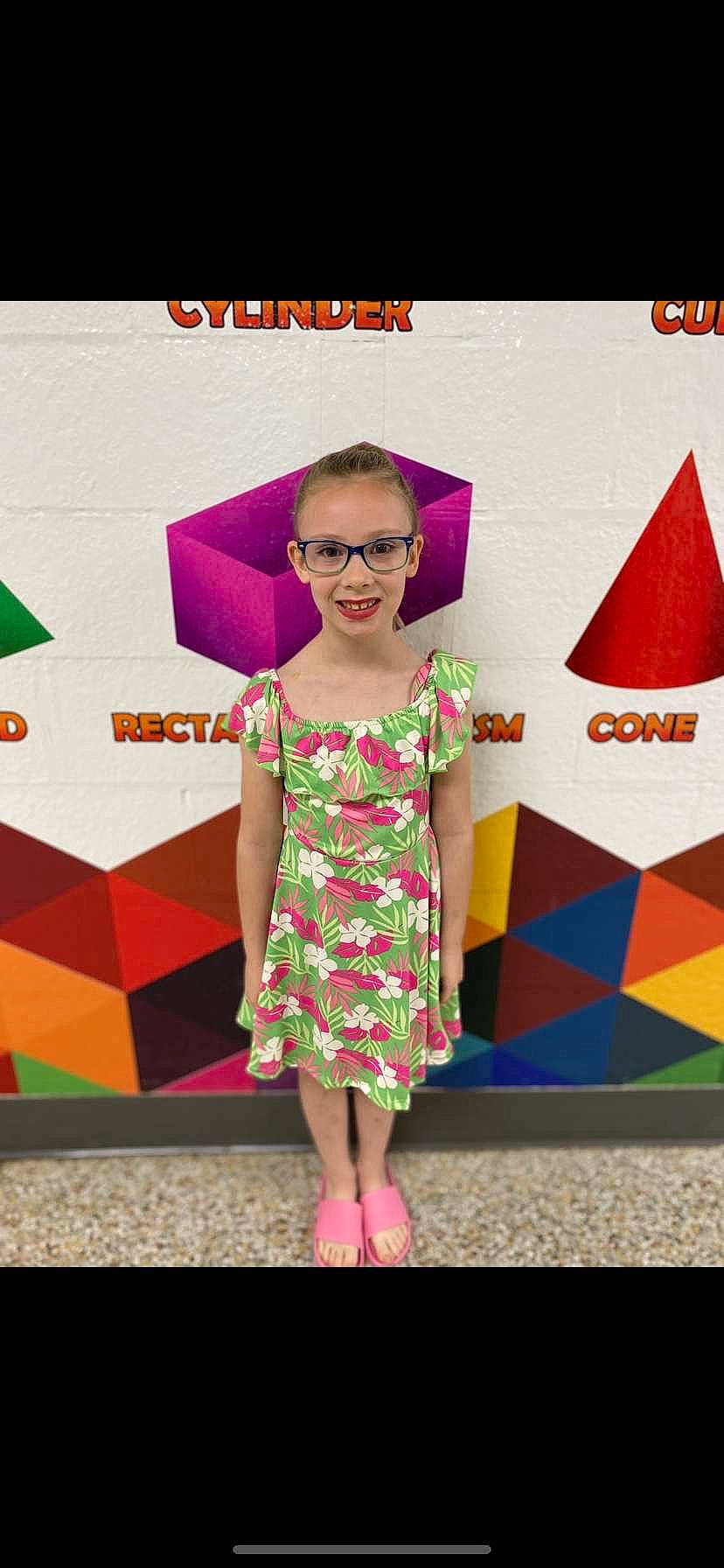 Braylee is registered to the contest to win money with this photo: art, day_dress, electric_blue, event, eyewear, fashion_design, font, glasses, happy, joy, magenta, pattern, person, pink, product, purple, rectangle, sleeve, smile, triangle