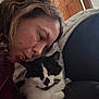 Buttons is registered to the contest to win money with this photo: affection, animal_face, black_and_white_cat, cat, close_up, comfort, couch, cozy, curly_hair, domestic_animal, expression, feline, head, human_face, indoor, kiss, love, pet, relaxation, woman