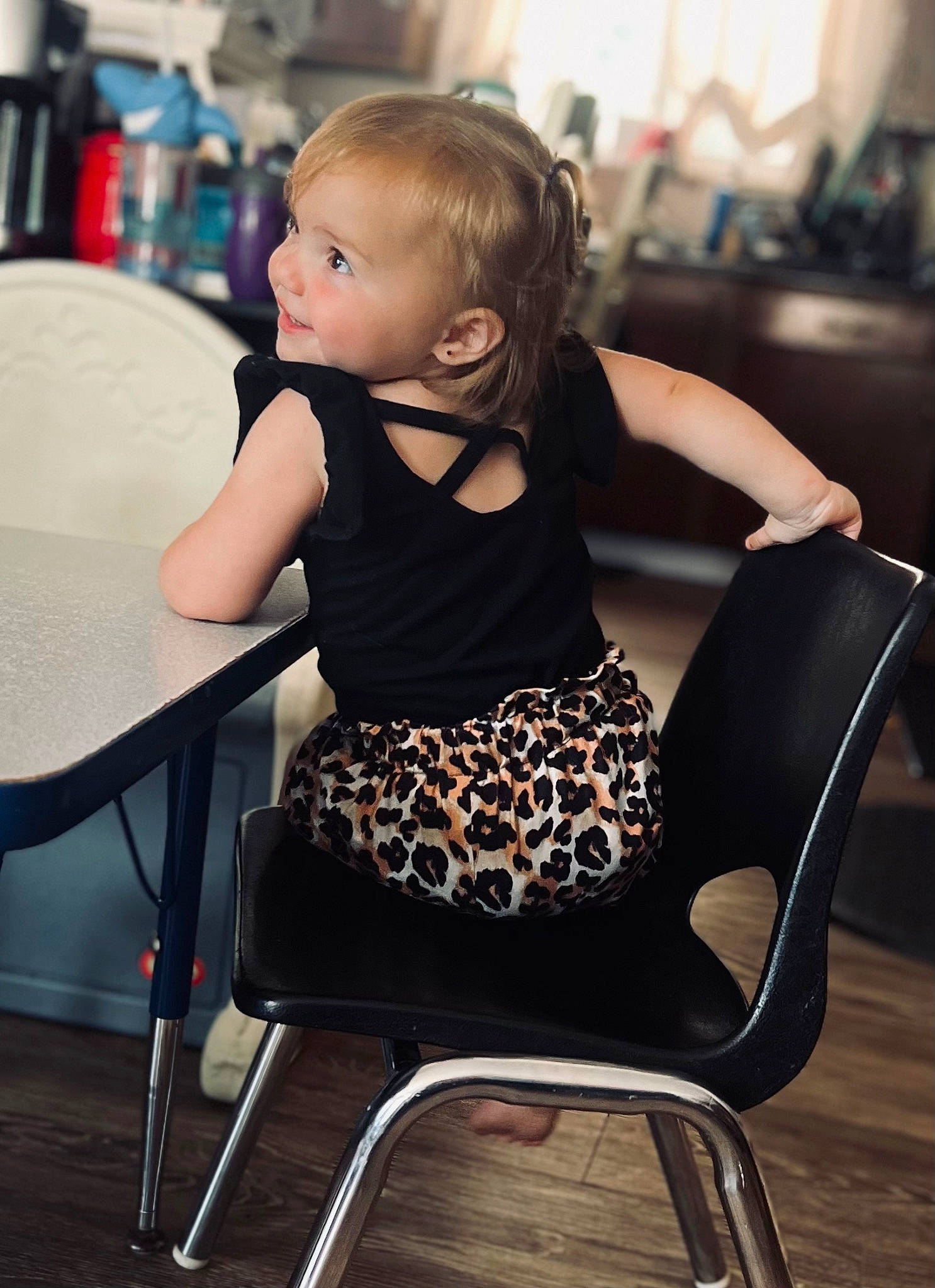 Raeleigh joined the competition — help win amazing prizes! baby_toddler_clothing, chair, child, fashion_design, flooring, human_leg, joint, knee, leg, leisure, monochrome_photography, pattern, person, photograph, room, sitting, t_shirt, table, thigh, toddler