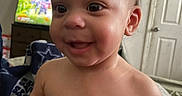 Elizabeth joined the competition — help win amazing prizes! baby, child, smiling, indoors, portrait, happy, face, skin, blanket, furniture, door, television, room, expression, hair, earrings, cheeks, torso, person, candid