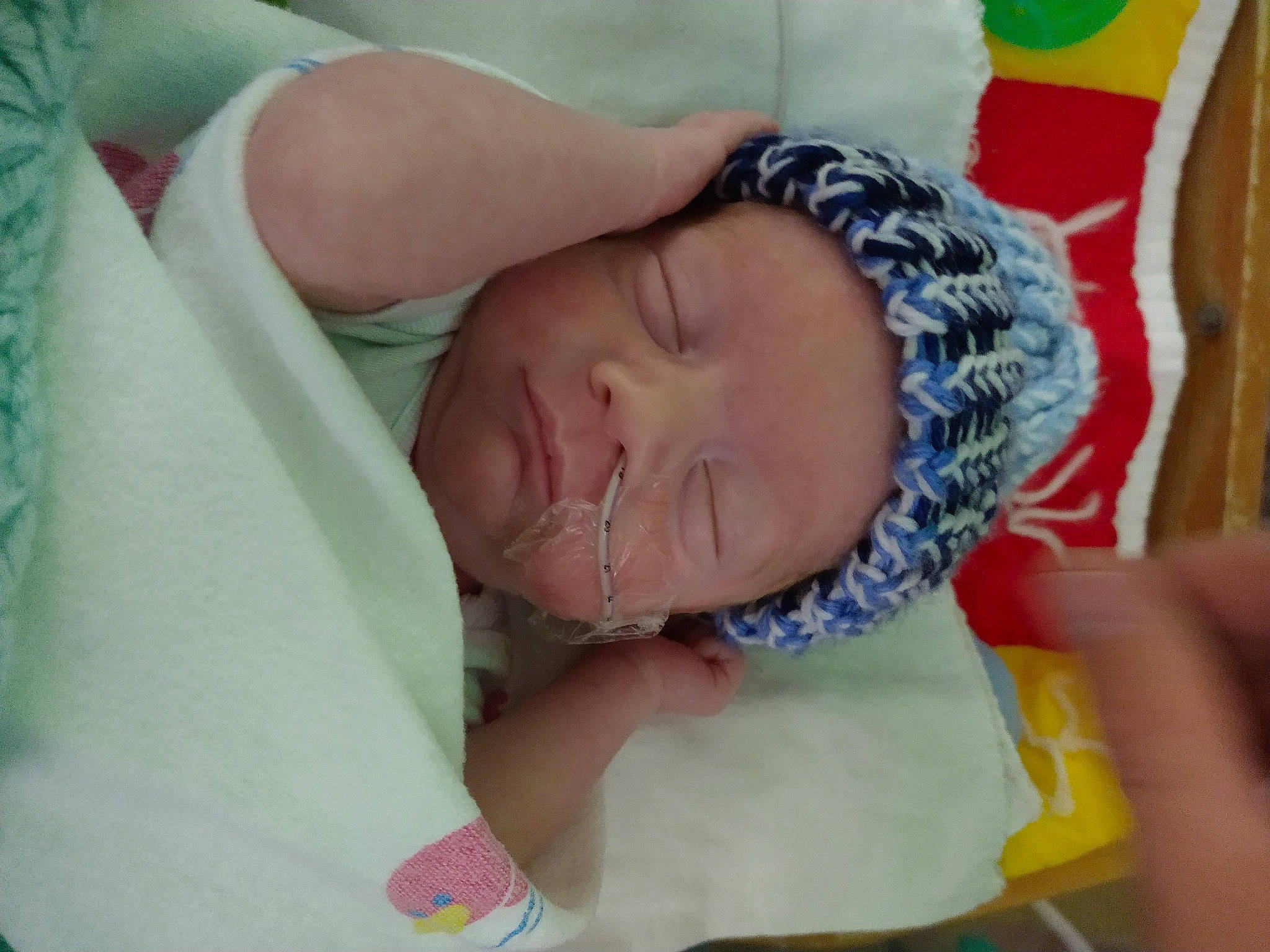 Dakota is registered to the contest to win money with this photo: baby, baby_products, baby_sleeping, baby_toddler_clothing, bedtime, child, childbirth, comfort, event, hand, happy, iris, linens, nap, pattern, person, room, skin, sleep, textile