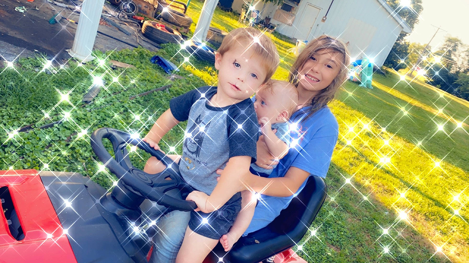 David is registered to the contest to win money with this photo: child, city, electric_blue, event, fun, grass, happy, human_leg, joy, lap, leisure, pattern, person, plaid, plant, recreation, shorts, summer, t_shirt, tartan