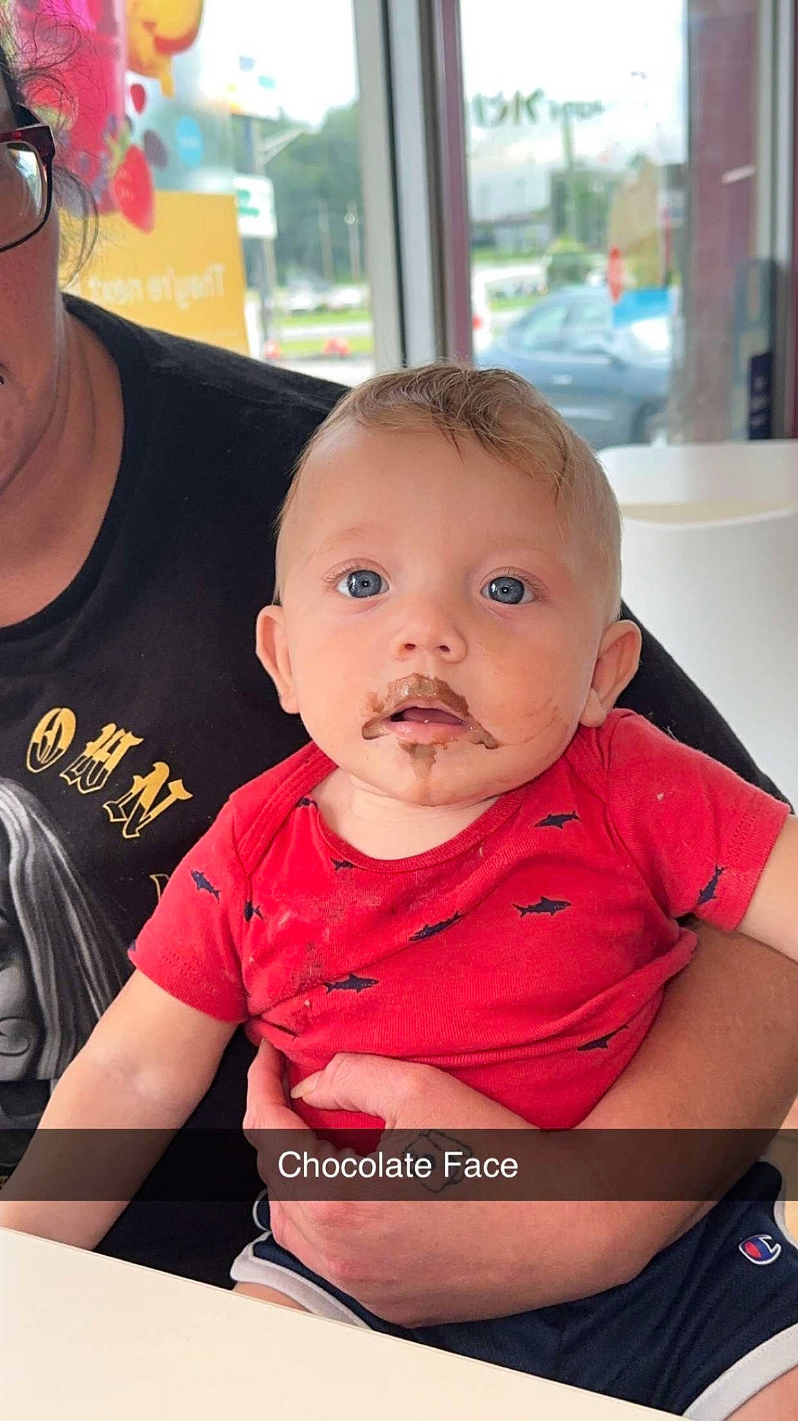 Ayden is registered to the contest to win money with this photo: baby, baby_toddler_clothing, baseball_cap, cap, chair, cheek, child, eyewear, fun, happy, hat, iris, person, portrait_photography, recreation, sitting, sleeve, t_shirt, table, toddler