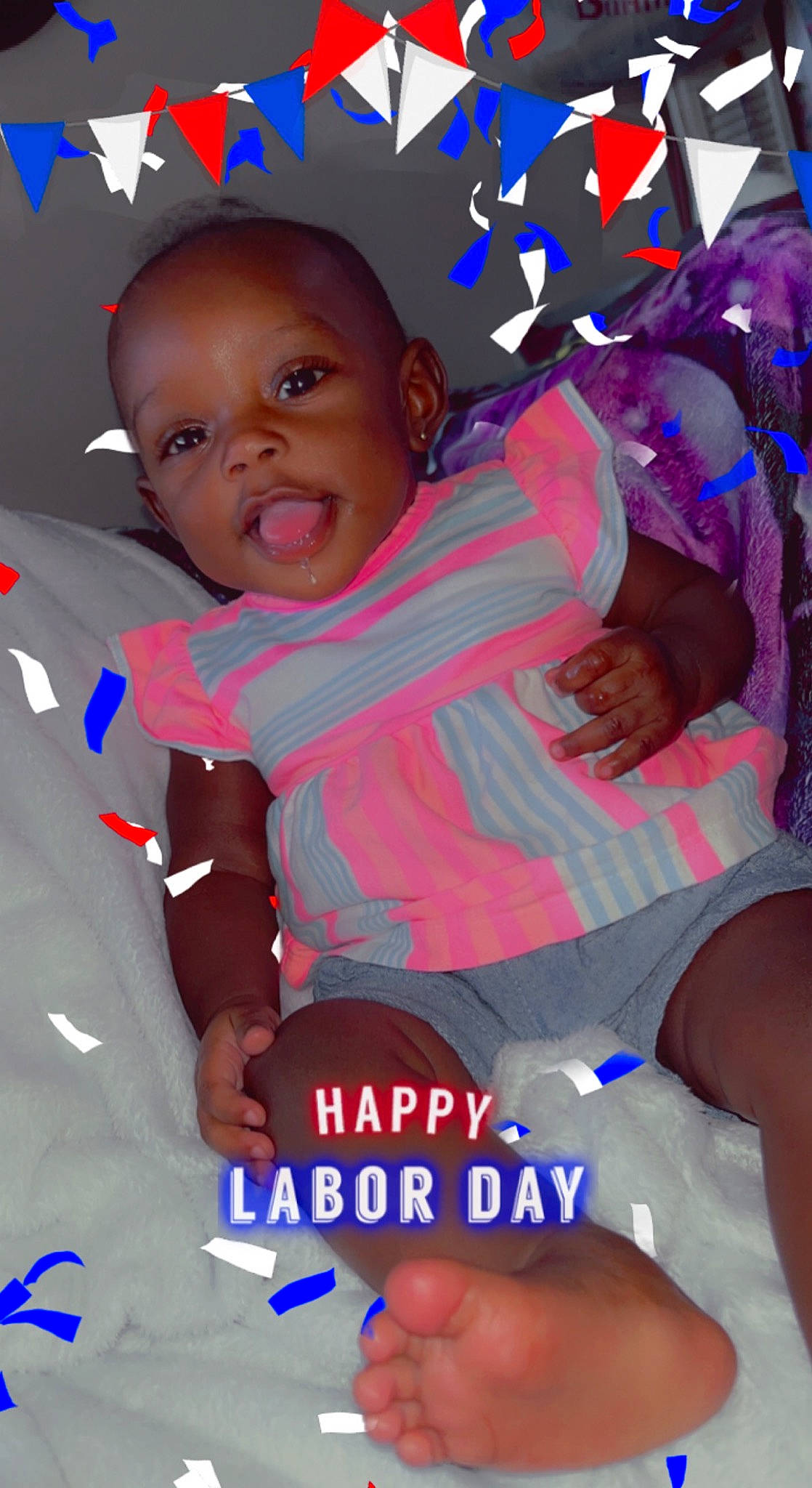 Faith is registered to the contest to win money with this photo: baby, baby_products, baby_toddler_clothing, blue, cheek, child, comfort, electric_blue, facial_expression, finger, fun, hand, happy, lap, magenta, person, pink, red, t_shirt, thigh