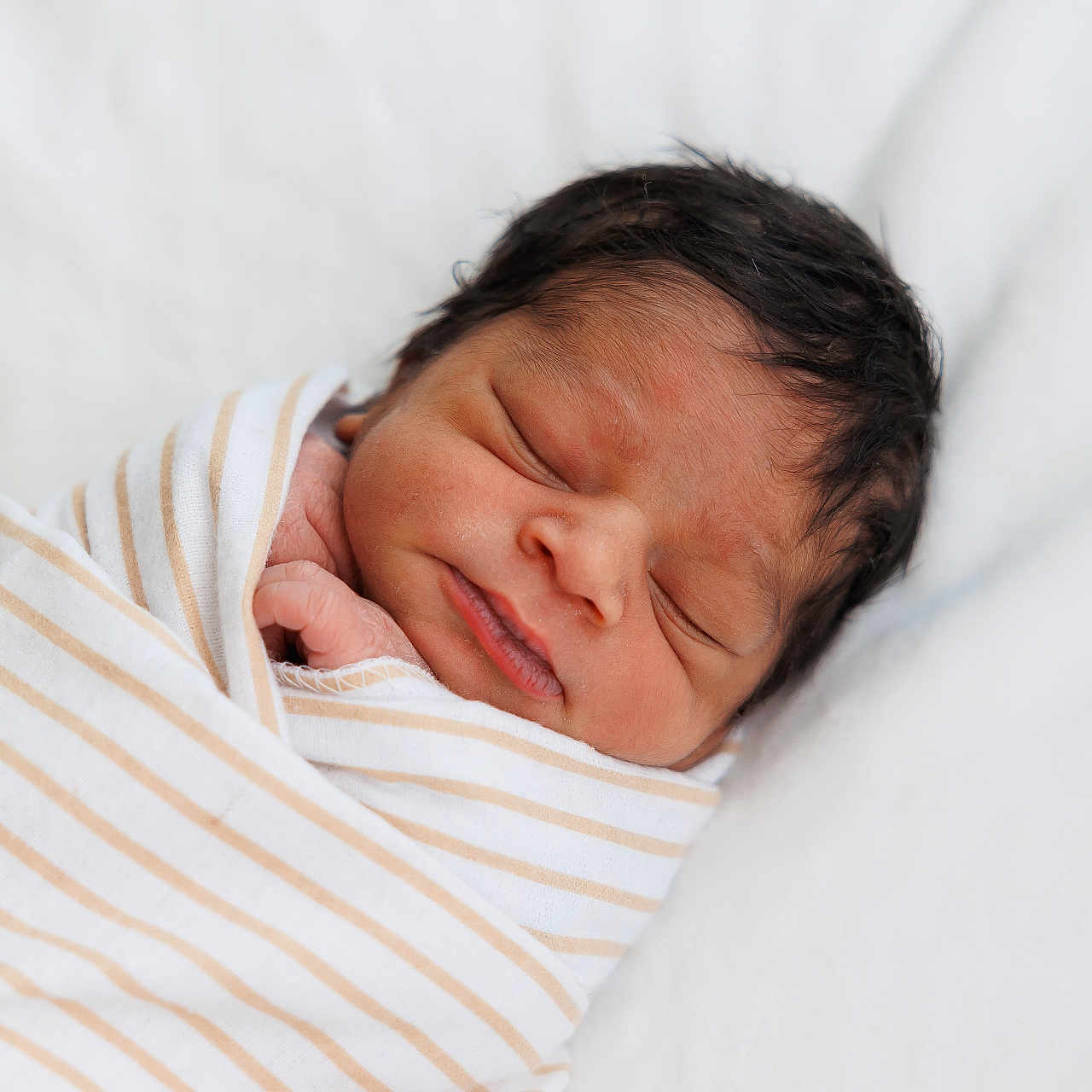 Kyaire joined the competition — help win amazing prizes! newborn, baby, sleeping, blanket, striped, infant, wrapped, peaceful, resting, soft, cozy, portrait, child, cute, face, human, skin, head, closed_eyes, indoors