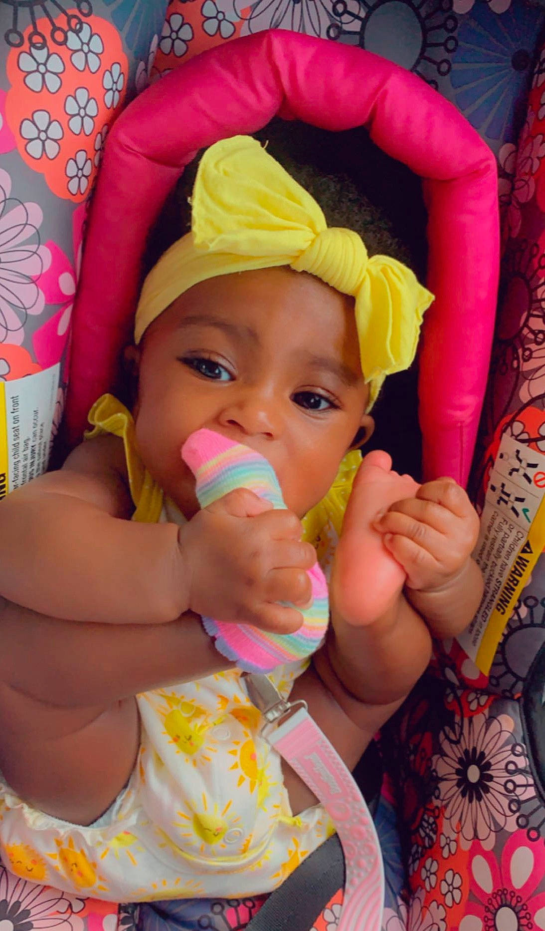 Halo is registered to the contest to win money with this photo: baby, baby_products, cheek, child, headwear, lip, mouth, nose, person, product, skin, toddler, yellow