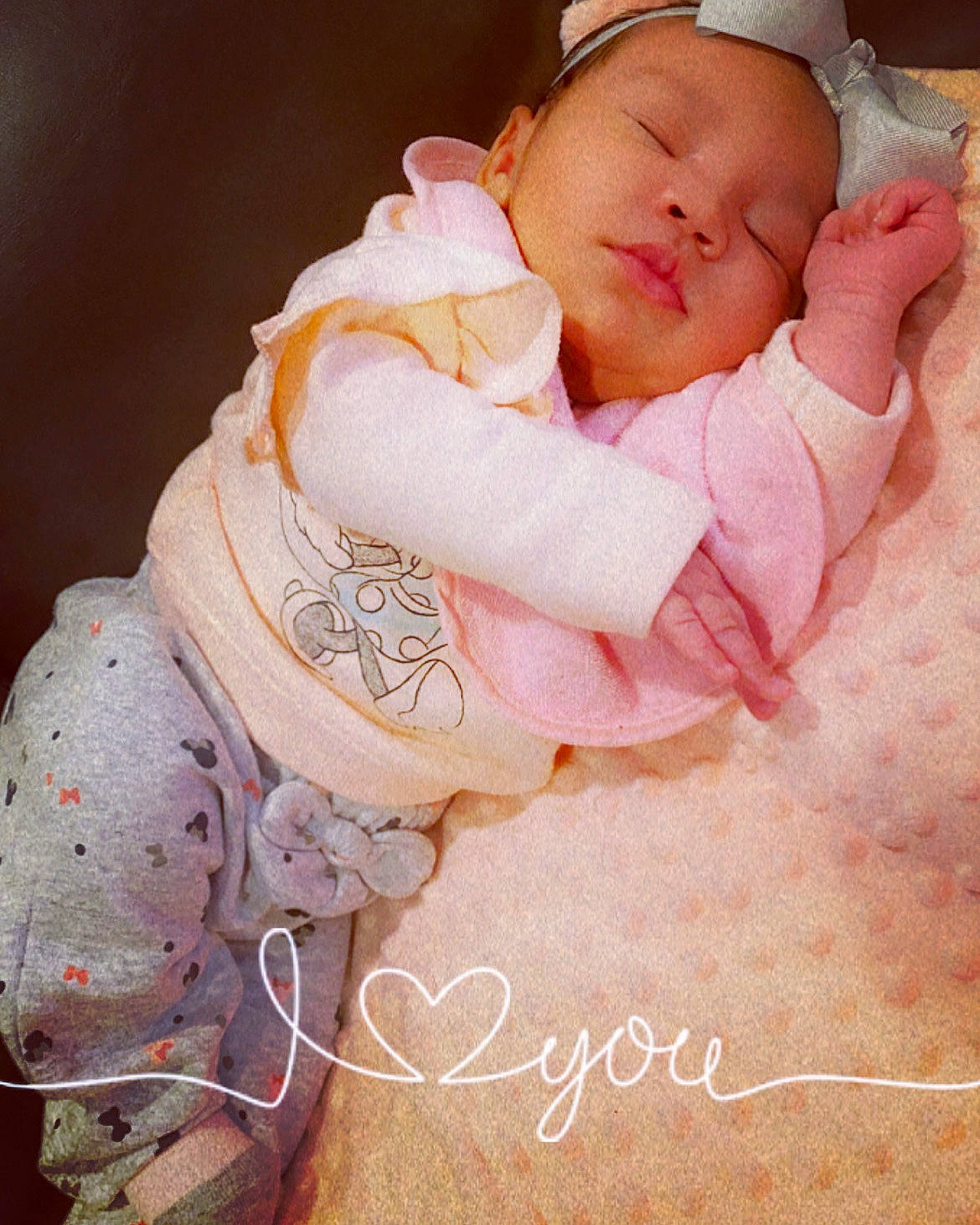 Nia joined the competition — help win amazing prizes! baby, baby_products, baby_sleeping, baby_toddler_clothing, cheek, child, comfort, eye, fashion_accessory, happy, lip, nail, pattern, peach, person, pink, portrait_photography, sitting, skin, sleeve