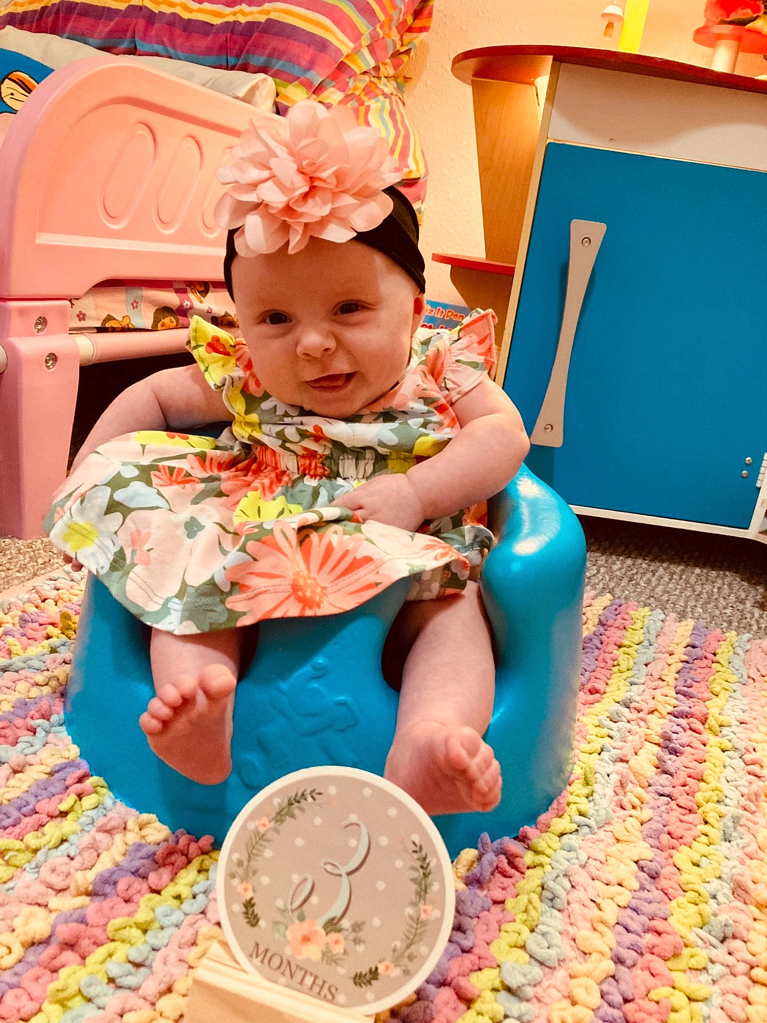 Gracelynn joined the competition — help win amazing prizes! baby, baby_toddler_clothing, carpet, chair, child, circle, flooring, fun, happy, headwear, leisure, orange, person, pink, play, purple, room, sitting, snapshot, textile