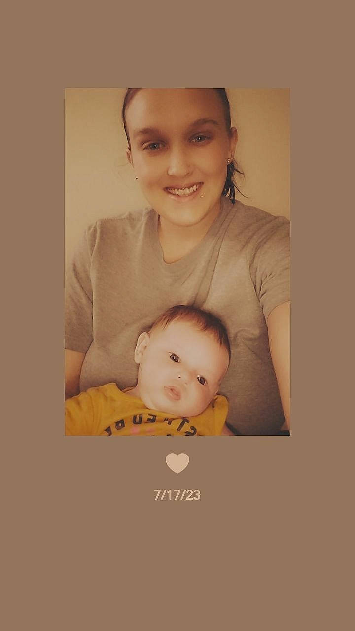 Daisy is registered to the contest to win money with this photo: art, baby, baby_toddler_clothing, cheek, child, comfort, face, flash_photography, gesture, hair, happy, iris, joy, love, nose, person, sitting, sleeve, smile, t_shirt