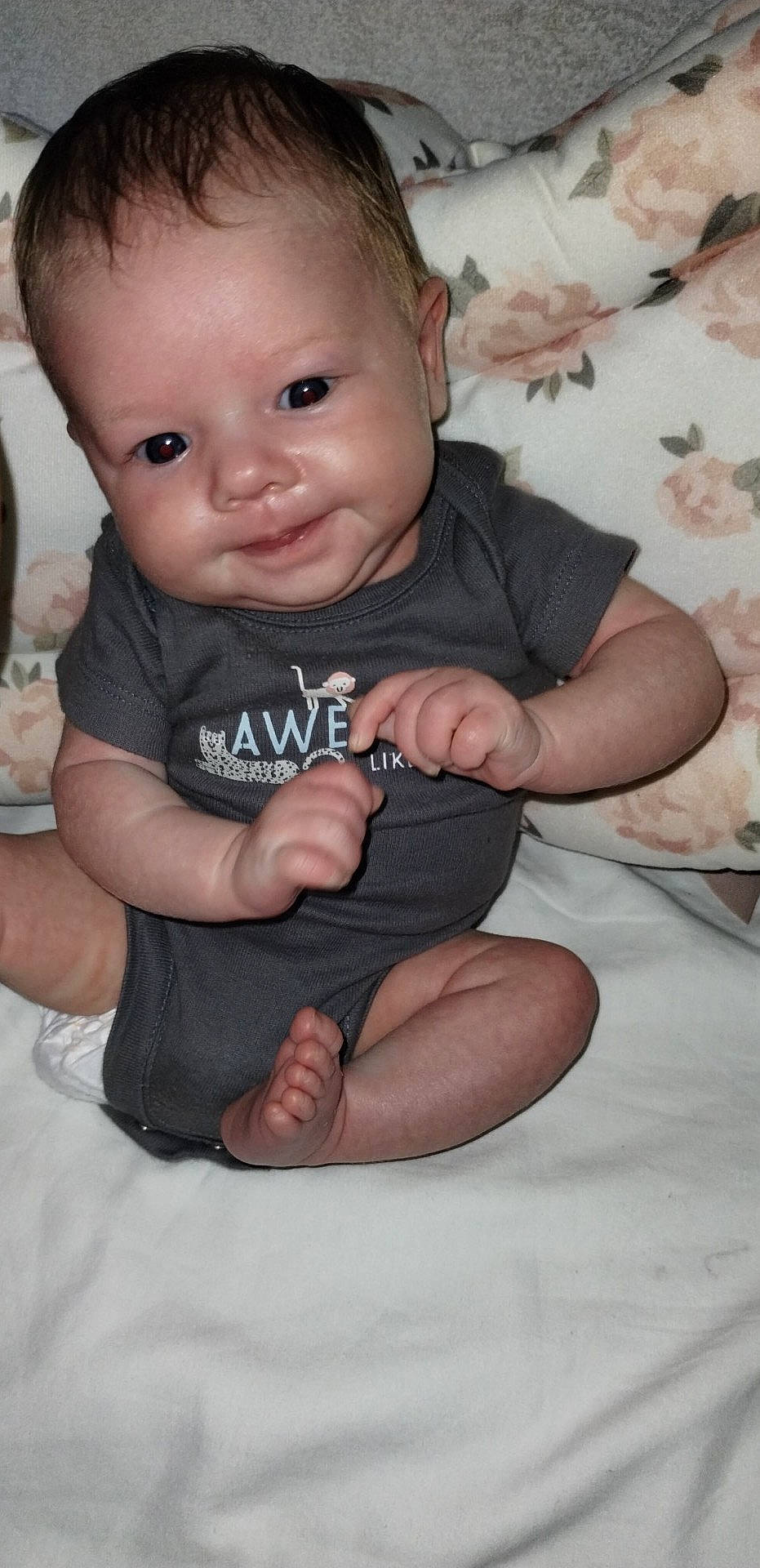 Daisy is registered to the contest to win money with this photo: baby, baby_toddler_clothing, cheek, chin, comfort, eye, face, finger, flash_photography, gesture, hair, happy, head, lip, mouth, person, pink, skin, sleeve, smile