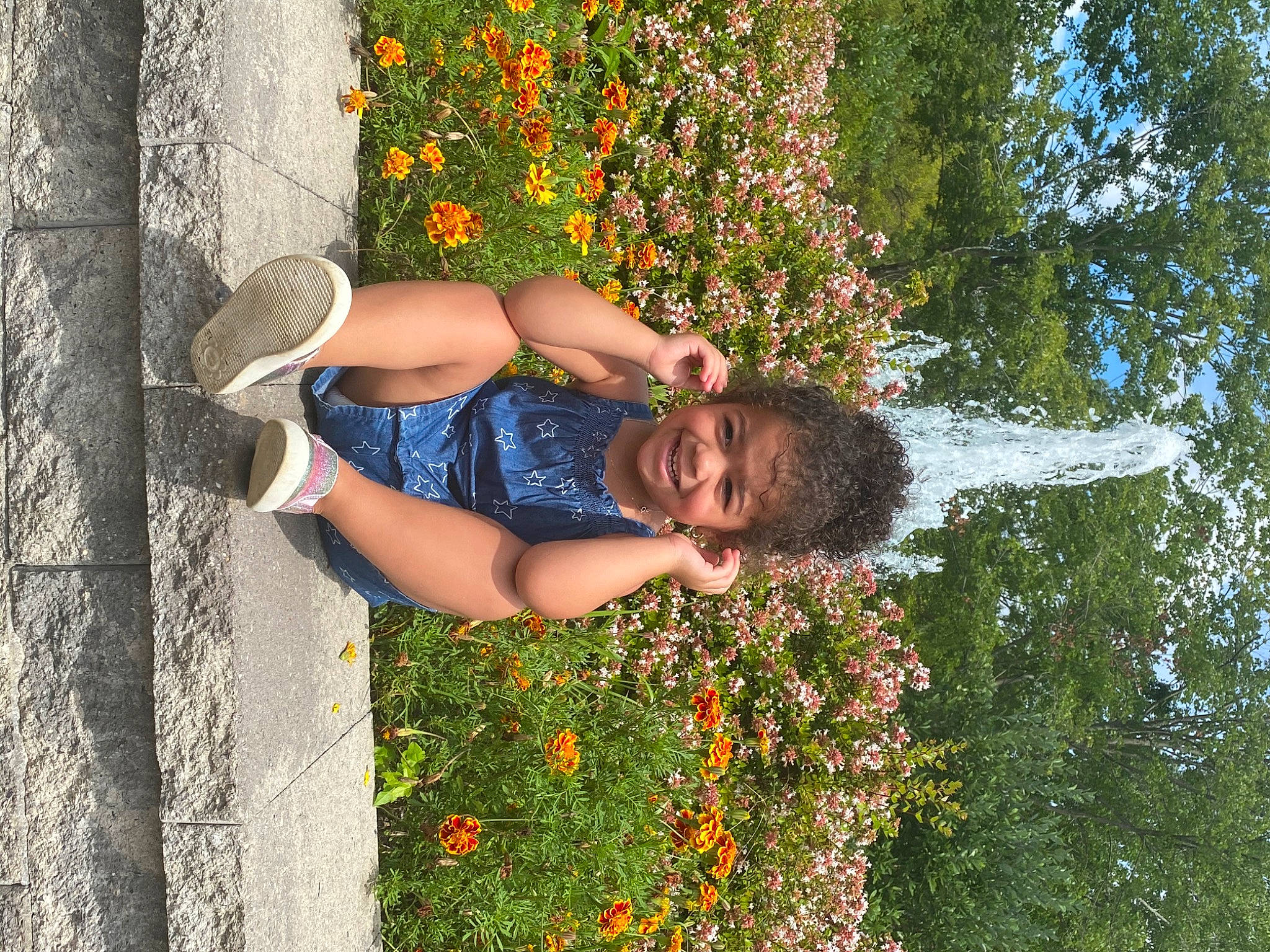 Karoline is registered to the contest to win money with this photo: eyewear, flower, fun, grass, happy, human_leg, joy, leaf, leisure, orange, people, people_in_nature, person, plant, shrub, smile, sunglasses, t_shirt, tree, trunk