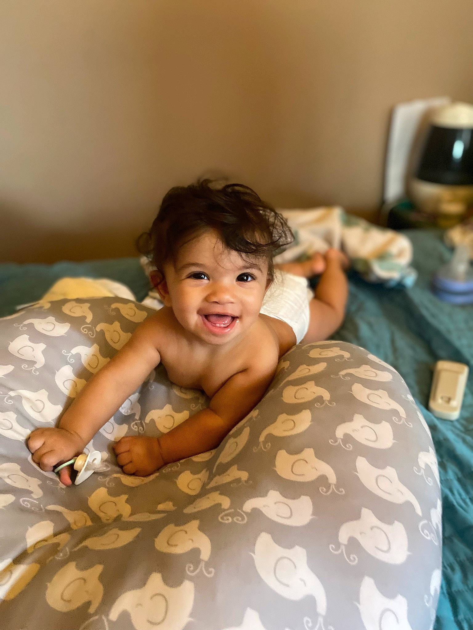 Karson is registered to the contest to win money with this photo: baby, bed, bed_sheet, bedding, bedroom, child, comfort, event, flooring, happy, kitchen_appliance, leisure, linens, person, room, sitting, skin, smile, textile, toddler