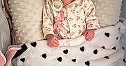 Mïa participe au concours pour gagner de l'argent avec cette photo : baby, bassinet, blanket, closeup, cozy, floral_pajamas, hands, heart_pattern, infant, newborn, nursery, pacifier, peaceful, pillow, plush, portrait, sleeping, sleepwear, soft_texture, swaddle