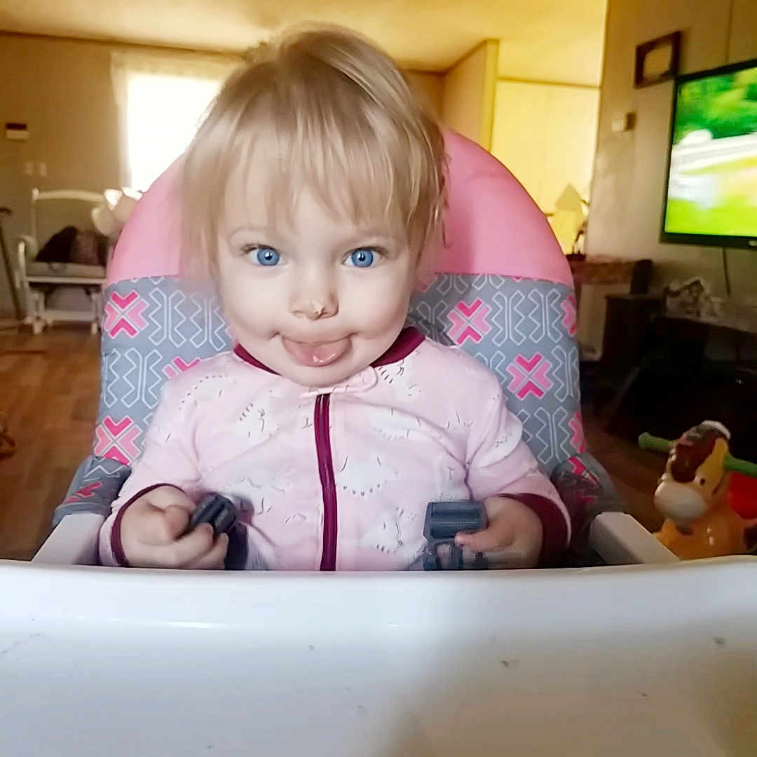 Khaleesia is registered to the contest to win money with this photo: cheek, child, day, eye, face, finger, girl, hair, head, human_hair_color, infant, iris, joy, mouth, organ, person, pink, play, product, skin