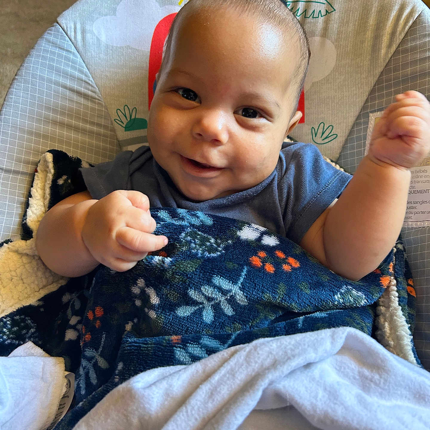 Jibril joined the competition — help win amazing prizes! baby, baby_seat, blanket, child, clothing, comfort, cozy, cute, expression, face, happy, head, indoor, infant, person, portrait, smiling, toddler, warm, young_child