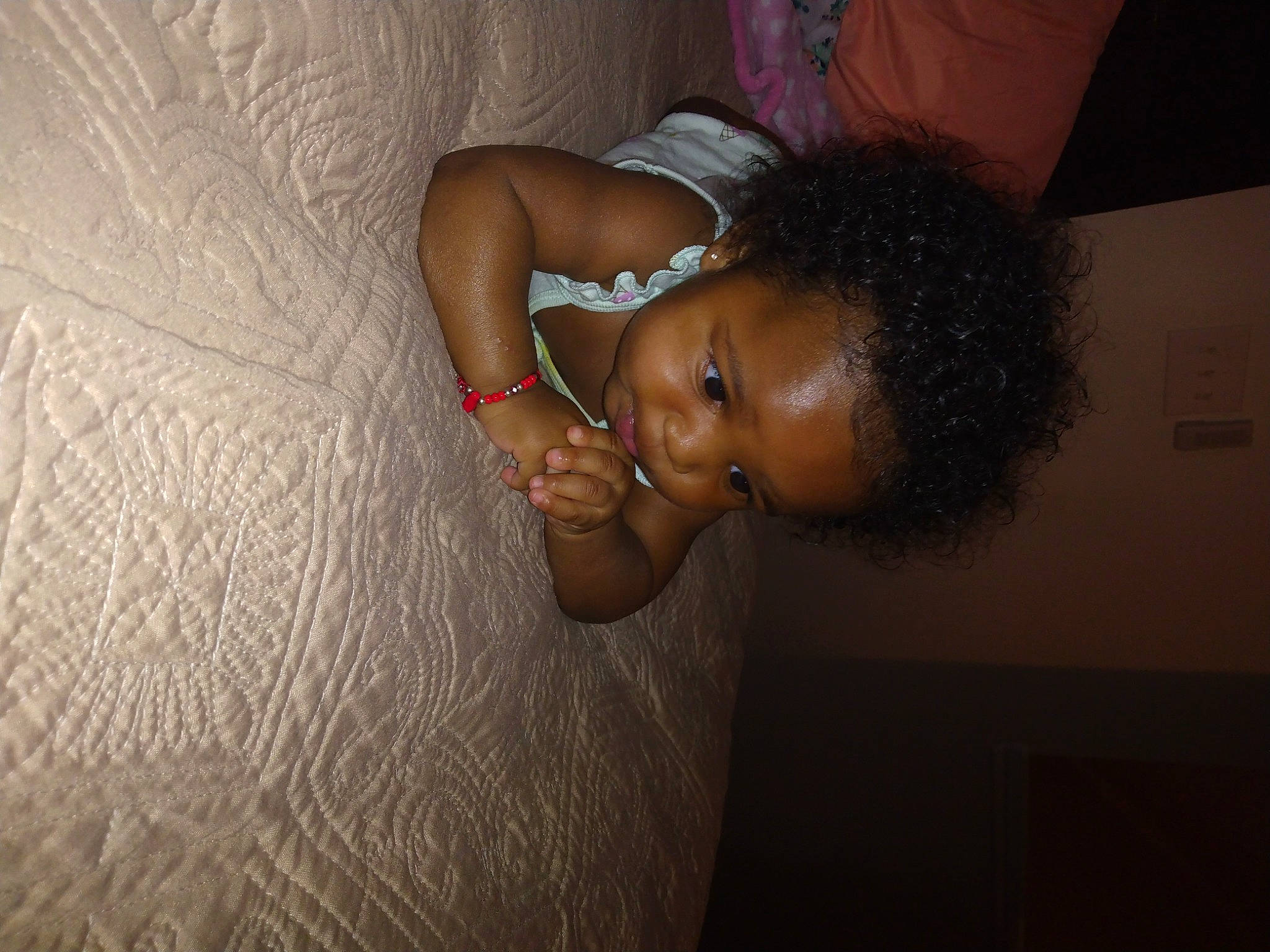 Nala Jai is registered to the contest to win money with this photo: arm, black_hair, chin, dress, ear, elbow, eyebrow, flash_photography, flooring, gesture, happy, human_leg, jewellery, lip, nail, neck, nose, person, smile, toddler