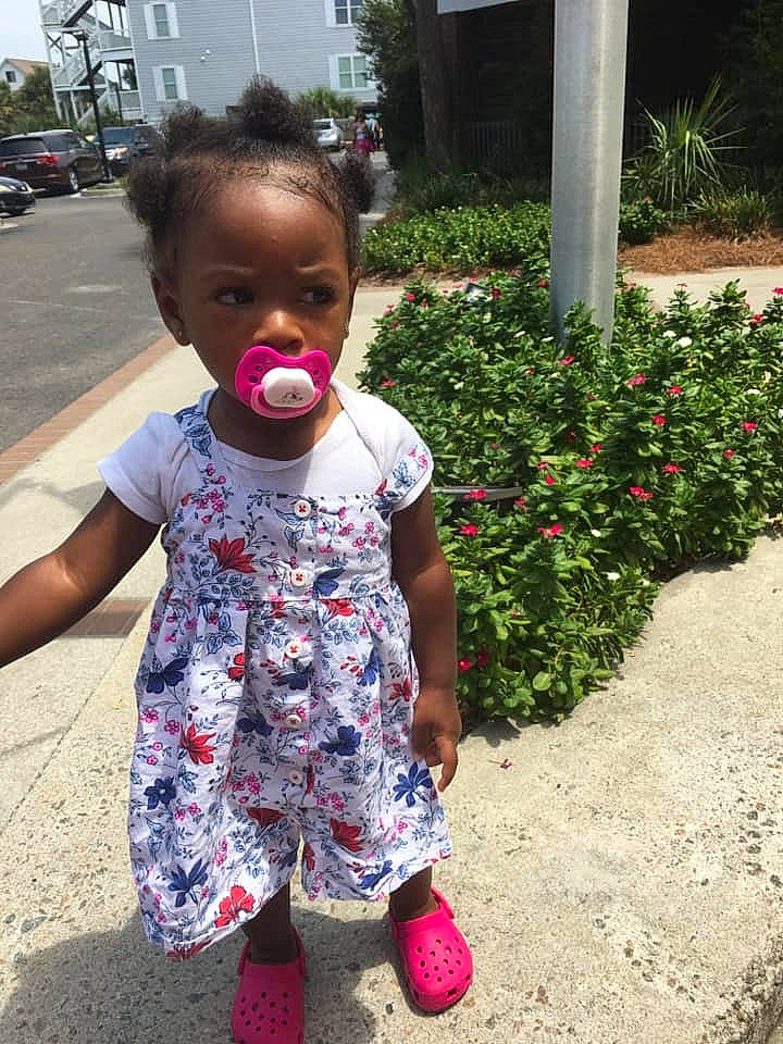 Dayla joined the competition — help win amazing prizes! baby, child, dress, face, flower, head, lip, nose, outerwear, person, pink, plant, play, recreation, shoe, smile, summer, toddler, vacation