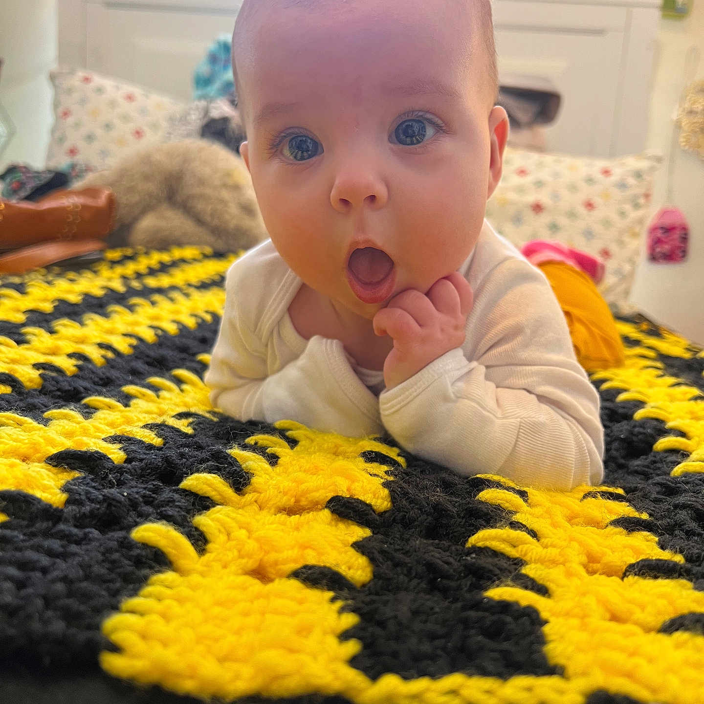 Lilly Rose joined the competition — help win amazing prizes! baby, bed, bedroom, blanket, bodypart, couch, crib, cushion, face, finger, furniture, hand, head, homedecor, infantbed, mouth, person, photography, portrait, quilt