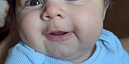 Russel joined the competition — help win amazing prizes! baby, child, face, smile, blue_shirt, chubby_cheeks, portrait, cute, infant, indoors, person, happy, young_child, apparel, sitting, skin, eyes, head, nose, mouth