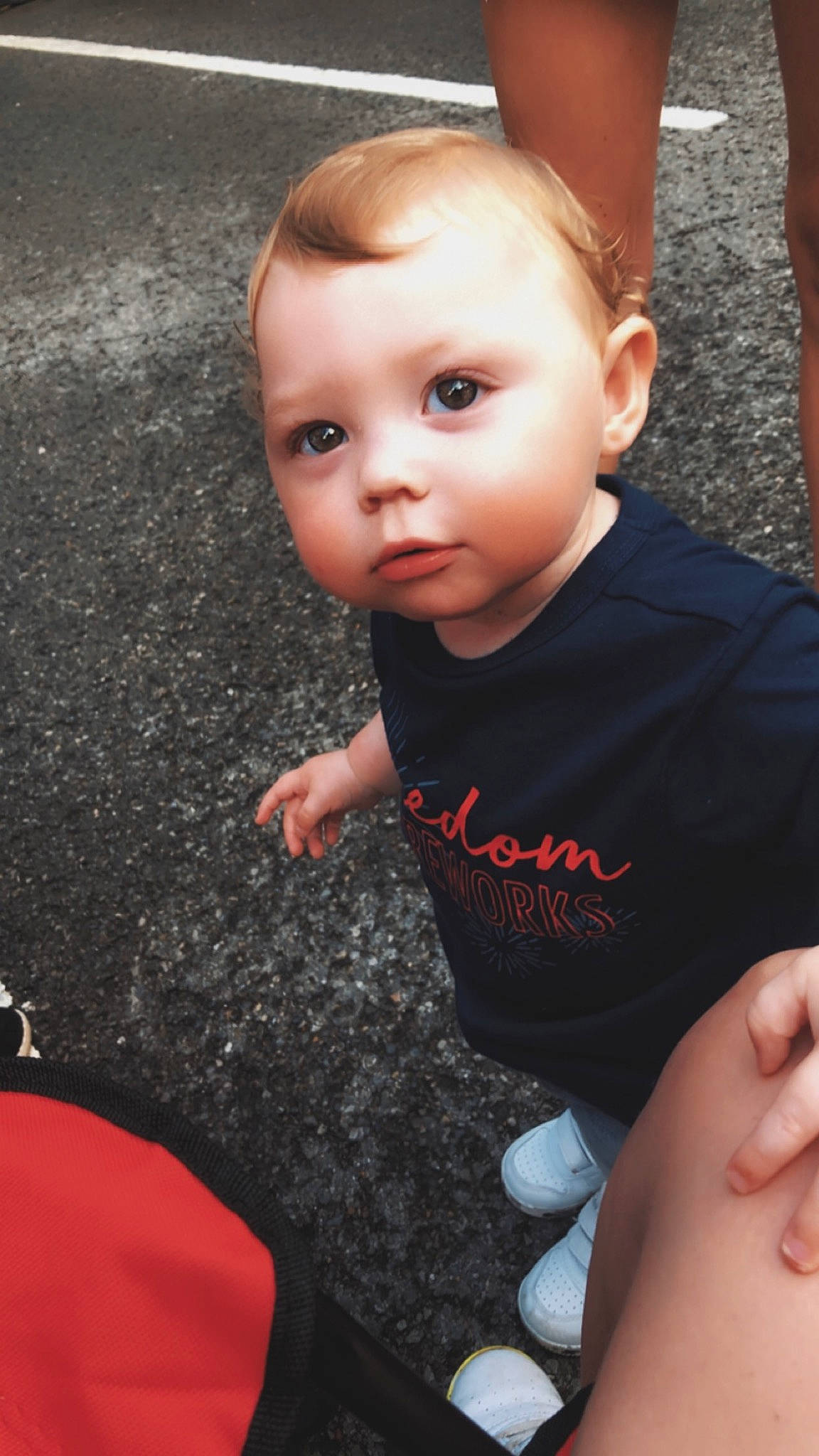 River is registered to the contest to win money with this photo: baby, baby_toddler_clothing, black, cheek, child, facial_expression, finger, flash_photography, fun, gesture, hairstyle, happy, leg, mammal, nose, person, skin, sleeve, standing, thumb