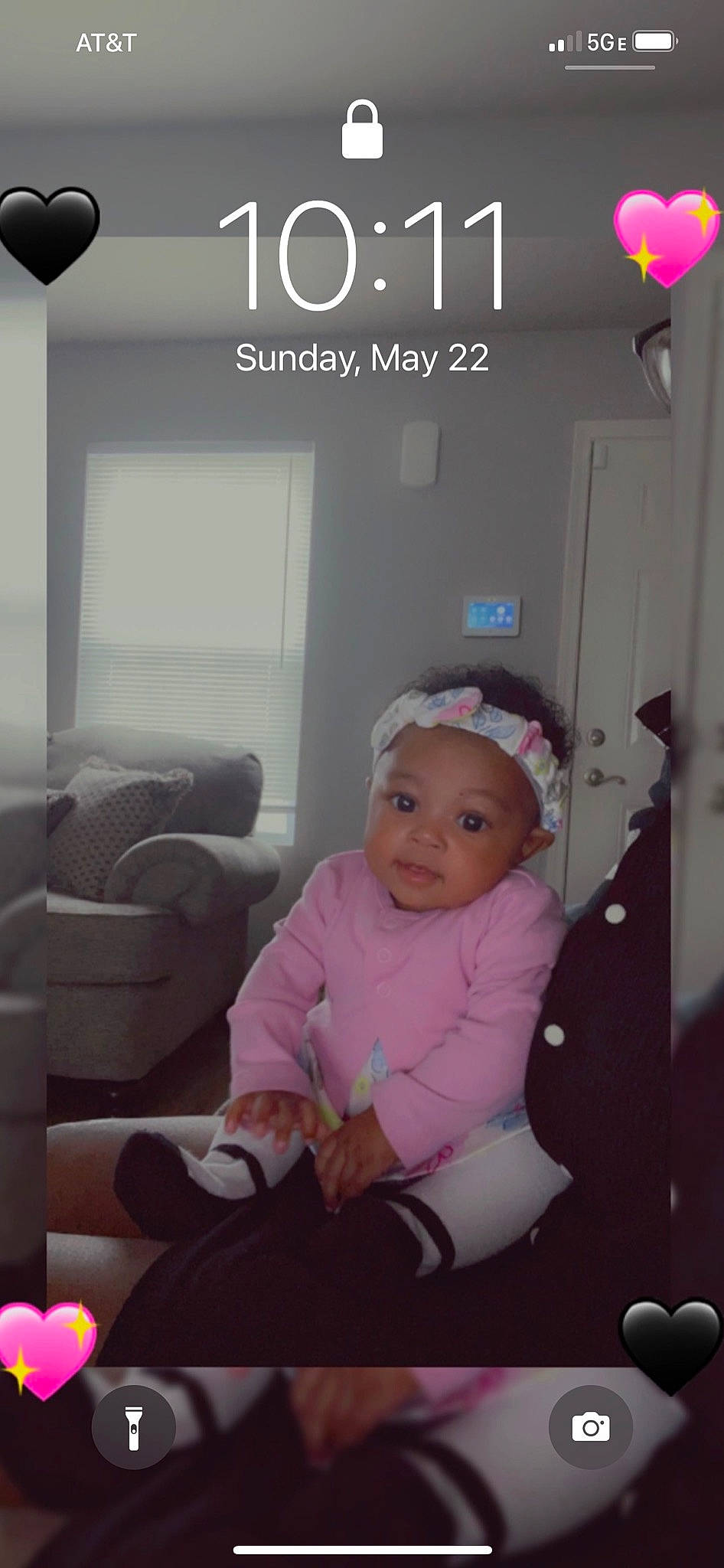 Sarai is registered to the contest to win money with this photo: baby, baby_toddler_clothing, chair, child, comfort, door, flooring, font, fun, happy, headwear, lap, logo, magenta, person, photo_caption, pink, product, room, sitting