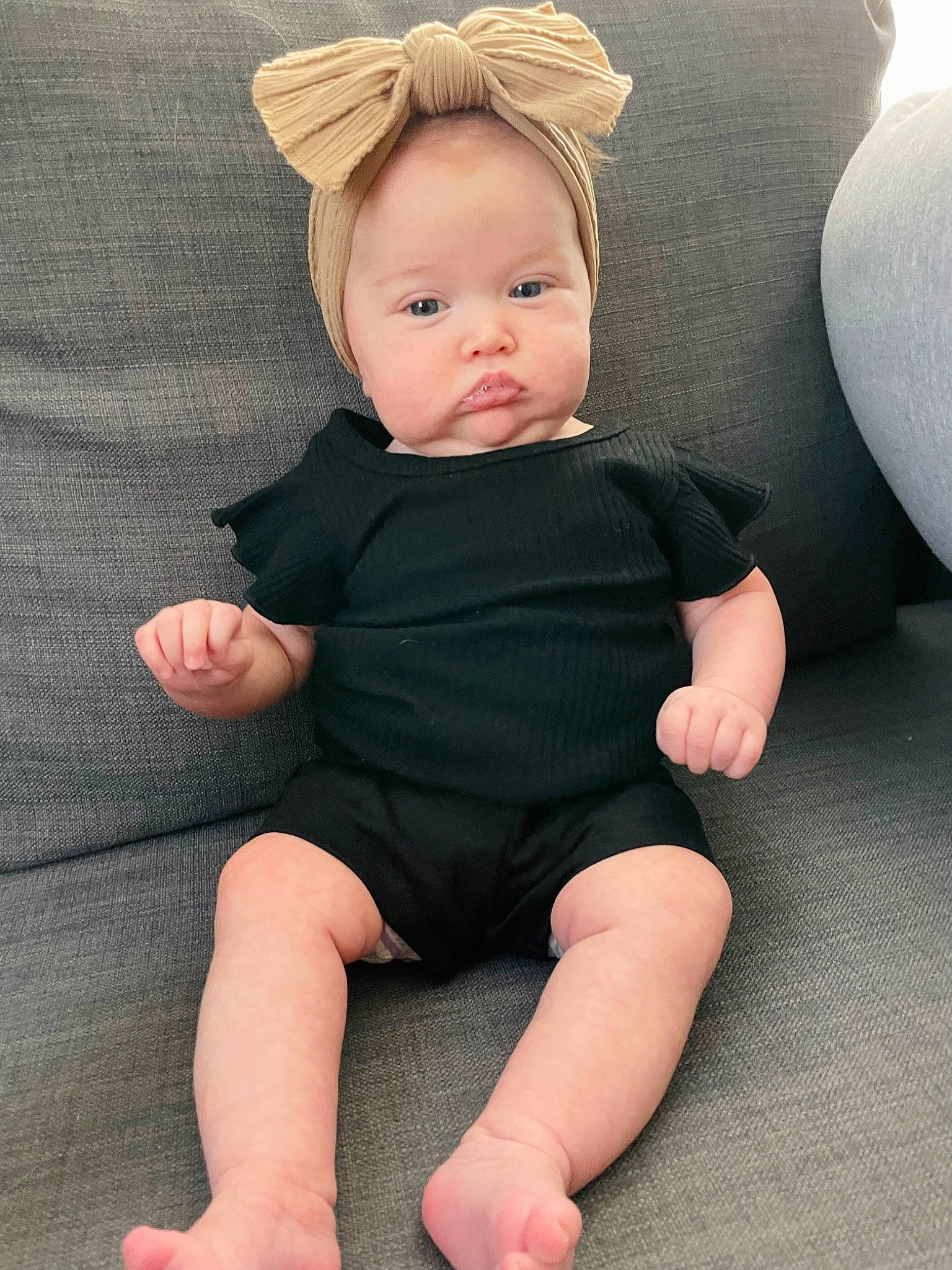 Hadley joined the competition — help win amazing prizes! baby, baby_toddler_clothing, barefoot, cheek, child, comfort, finger, foot, human_body, human_leg, knee, pattern, person, sitting, skin, sleeve, sock, thigh, toddler